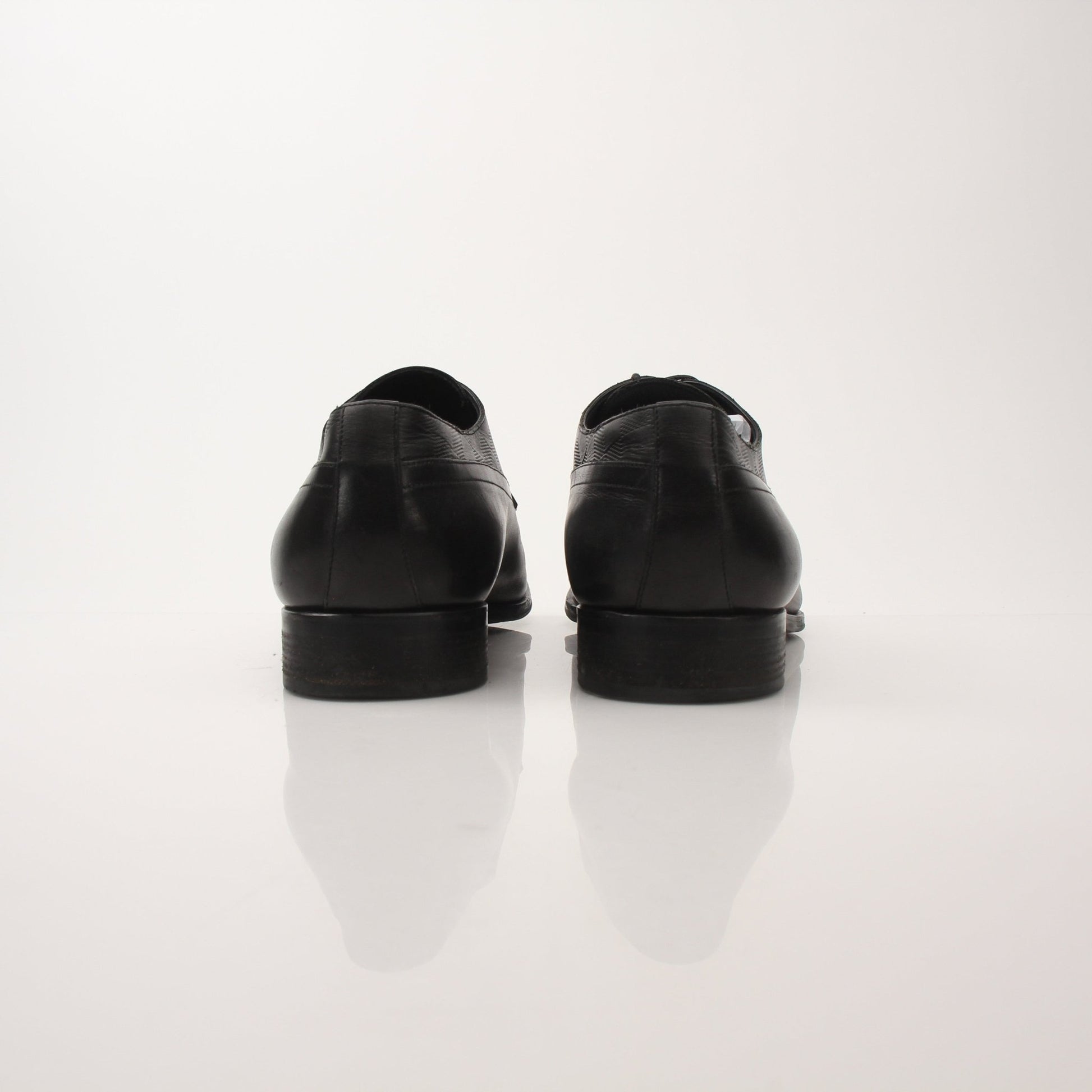 Gold & Beyond Louis Vuitton Men’s Haussmann Derby Shoes, stylish black leather dress shoes with classic design.