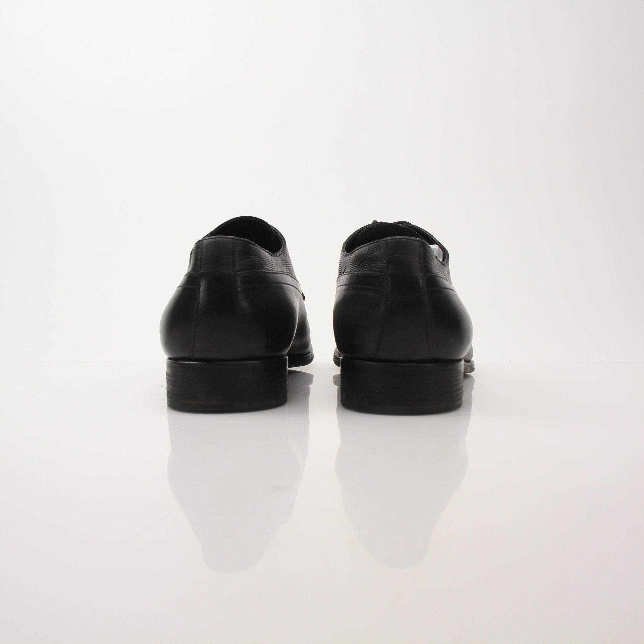 Gold & Beyond Louis Vuitton Men’s Haussmann Derby Shoes, stylish black leather dress shoes with classic design.