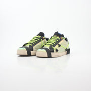 Dolce & Gabbana Neon Green Gold Portofino sneakers by Gold & Beyond, featuring vibrant green and gold accents on casual shoes.