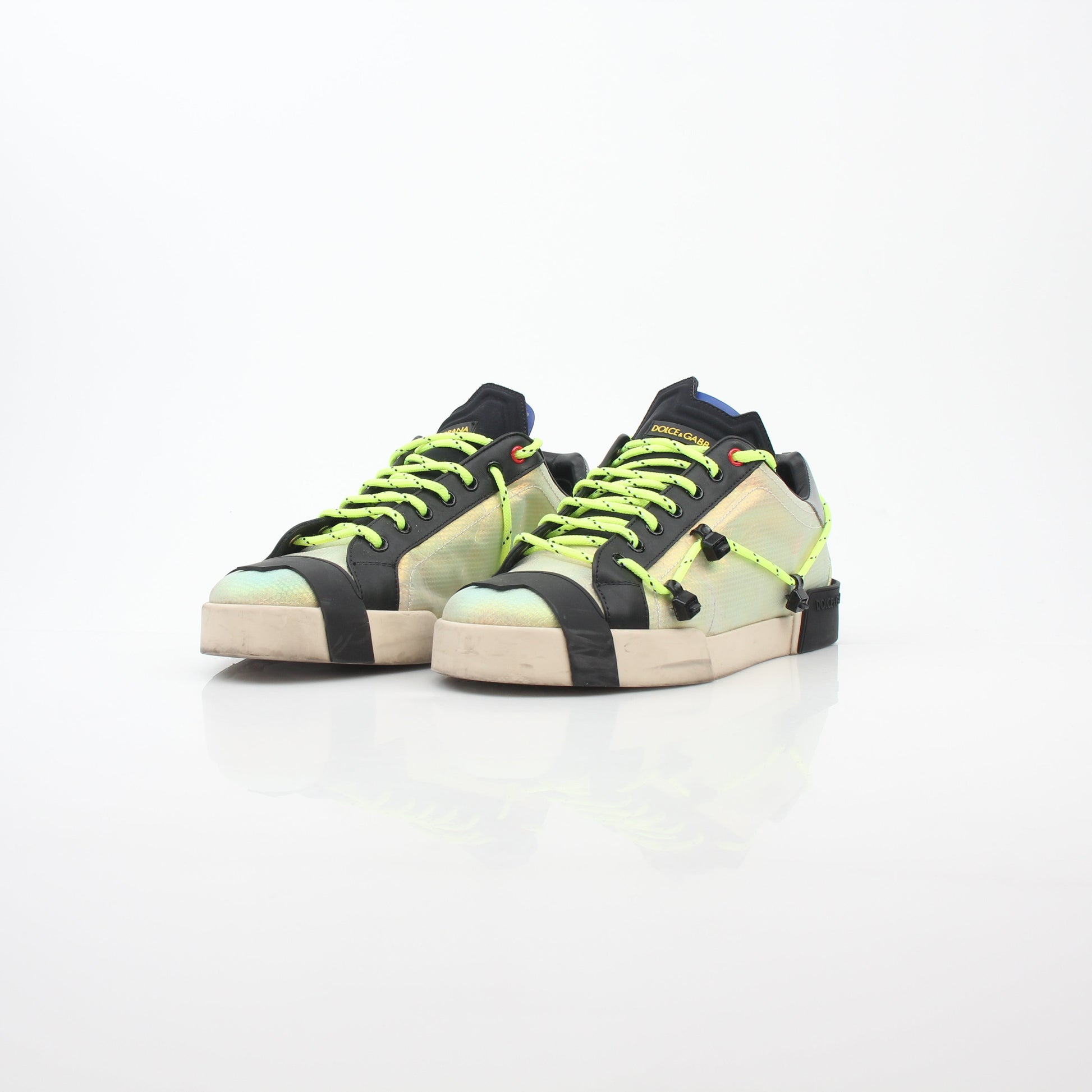 Dolce & Gabbana Neon Green Gold Portofino sneakers by Gold & Beyond, featuring vibrant green and gold accents on casual shoes.