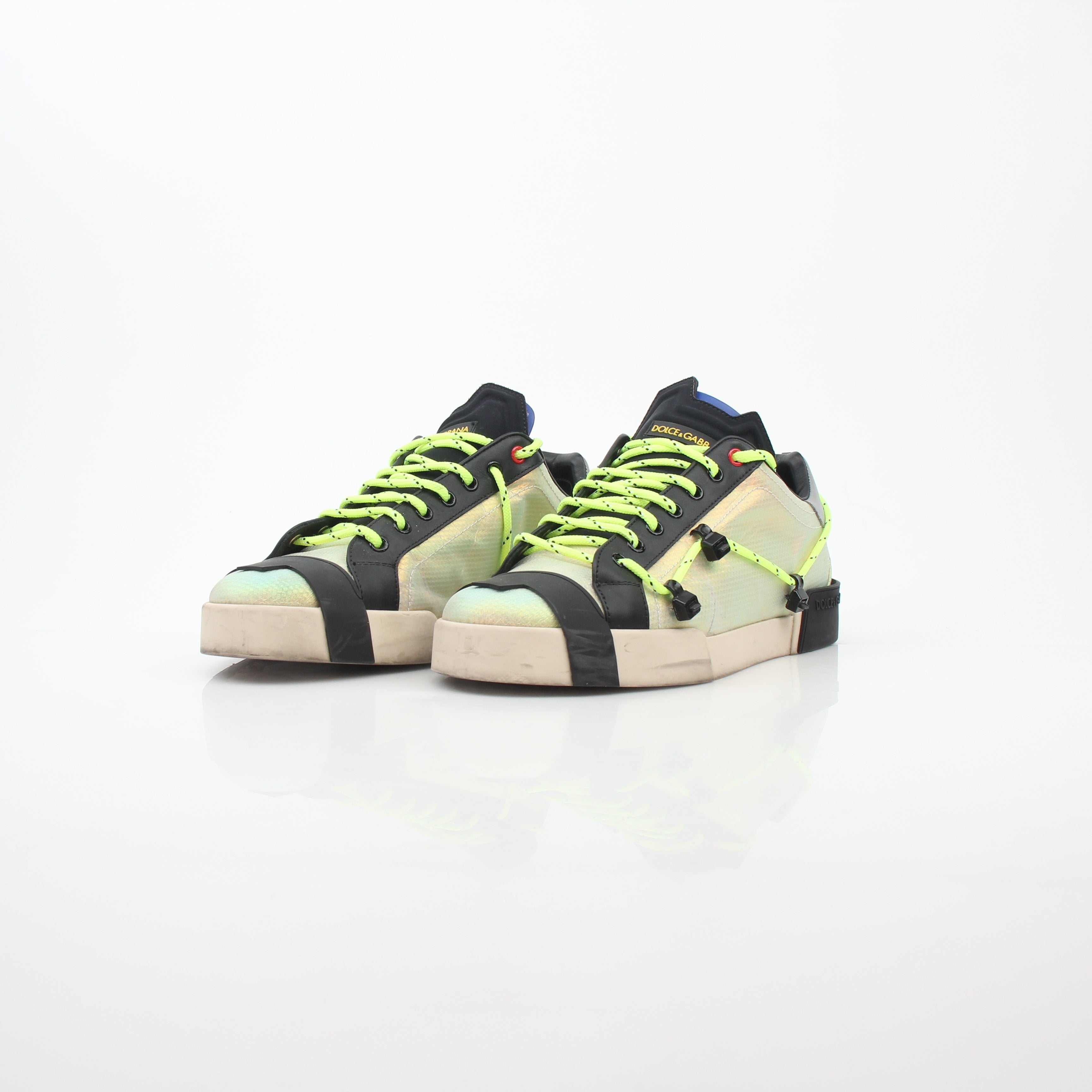 Dolce & Gabbana Neon Green Gold Portofino sneakers by Gold & Beyond, featuring vibrant green and gold accents on casual shoes.
