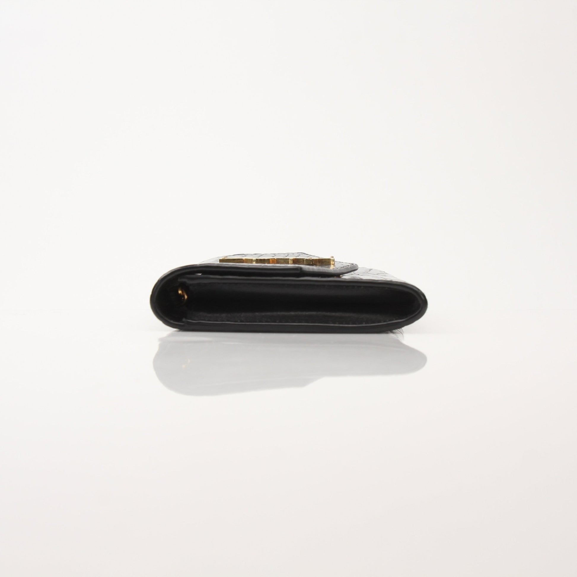 Gold & Beyond Saint Laurent Uptown Chain Wallet showing leather exterior, gold chain strap, and compact design.