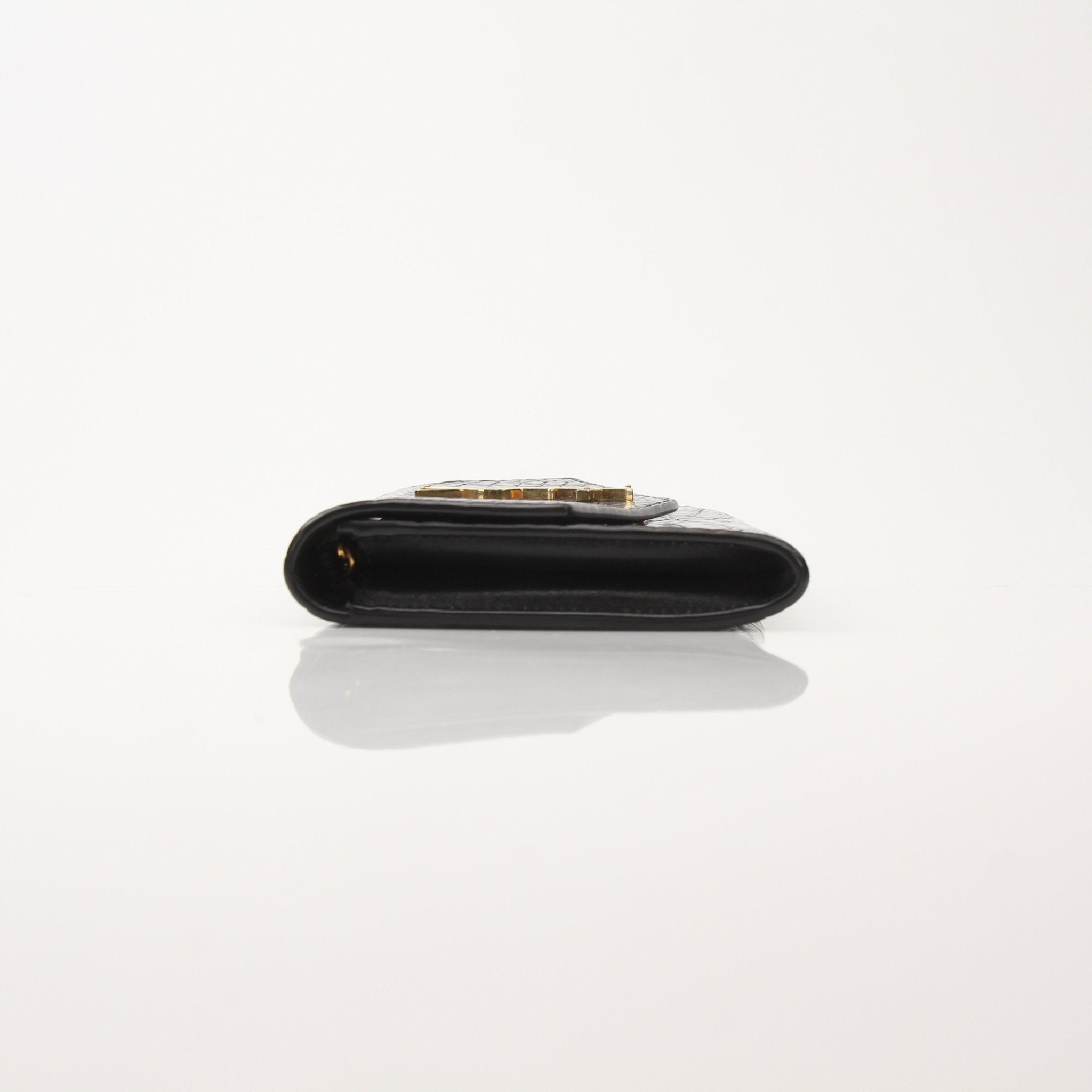 Gold & Beyond Saint Laurent Uptown Chain Wallet showing leather exterior, gold chain strap, and compact design.