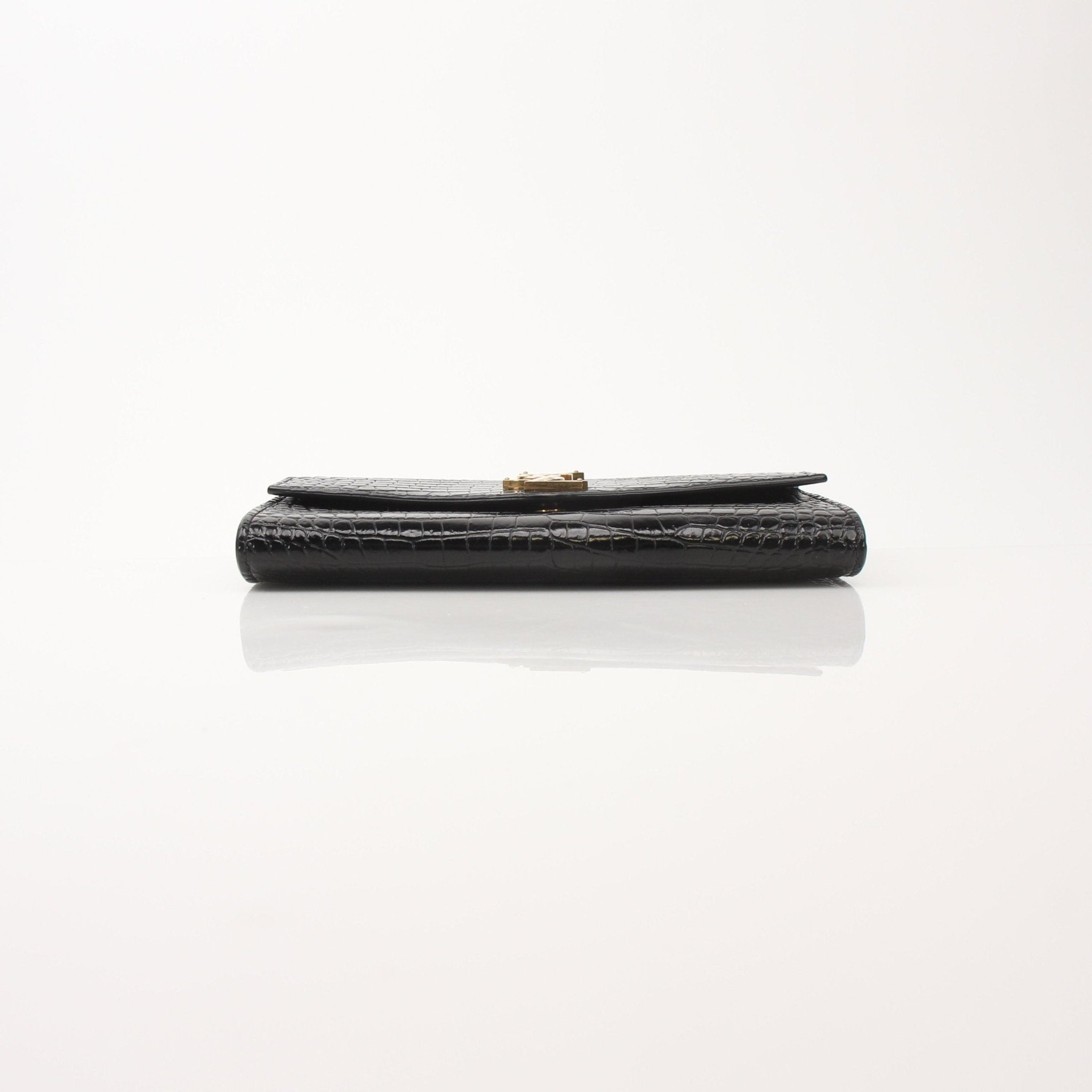 Gold & Beyond Saint Laurent Uptown Chain Wallet with gold chain and leather exterior, elegant and compact accessory for essentials.