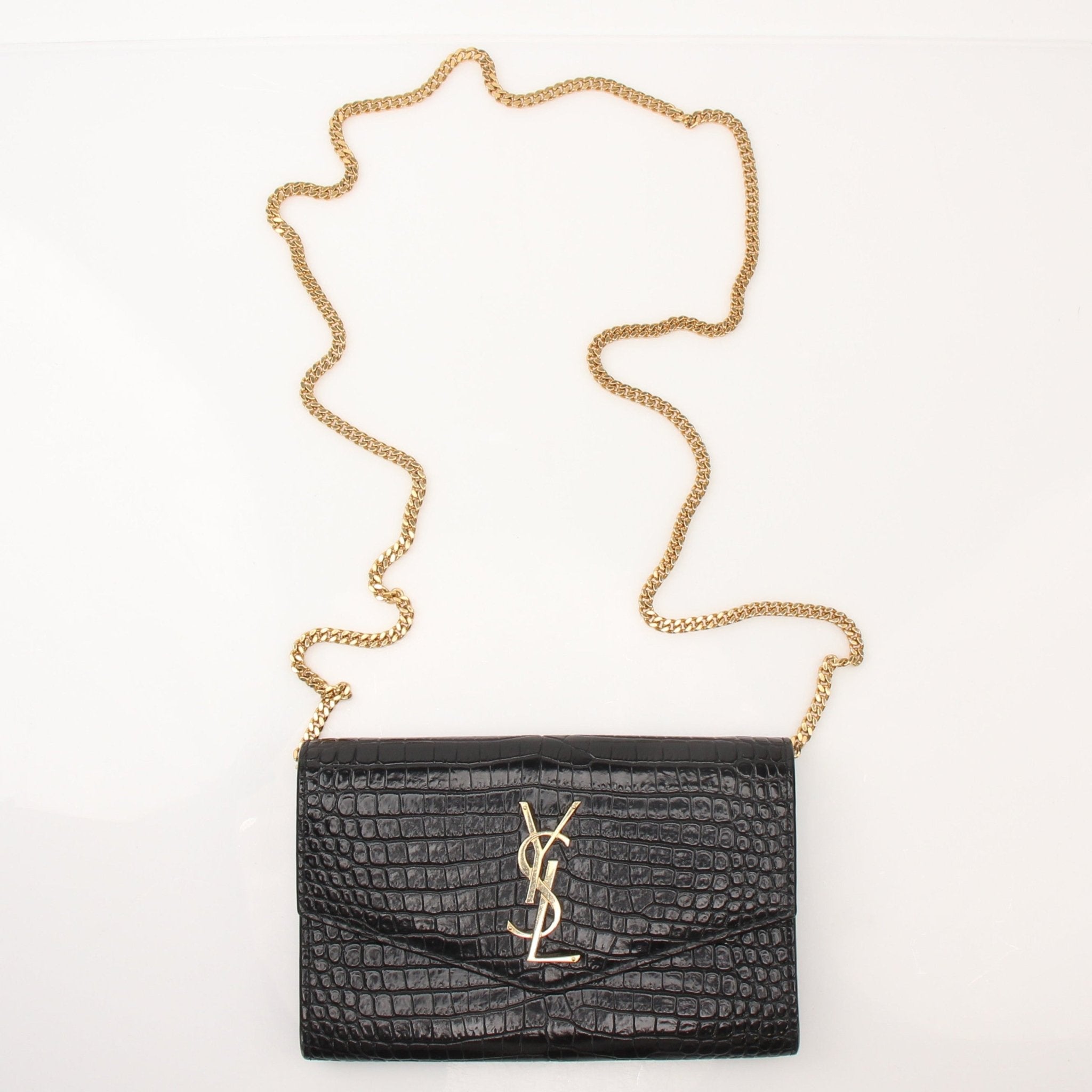 Gold & Beyond Saint Laurent Uptown Chain Wallet with gold chain and sleek leather design, shown on a neutral background.