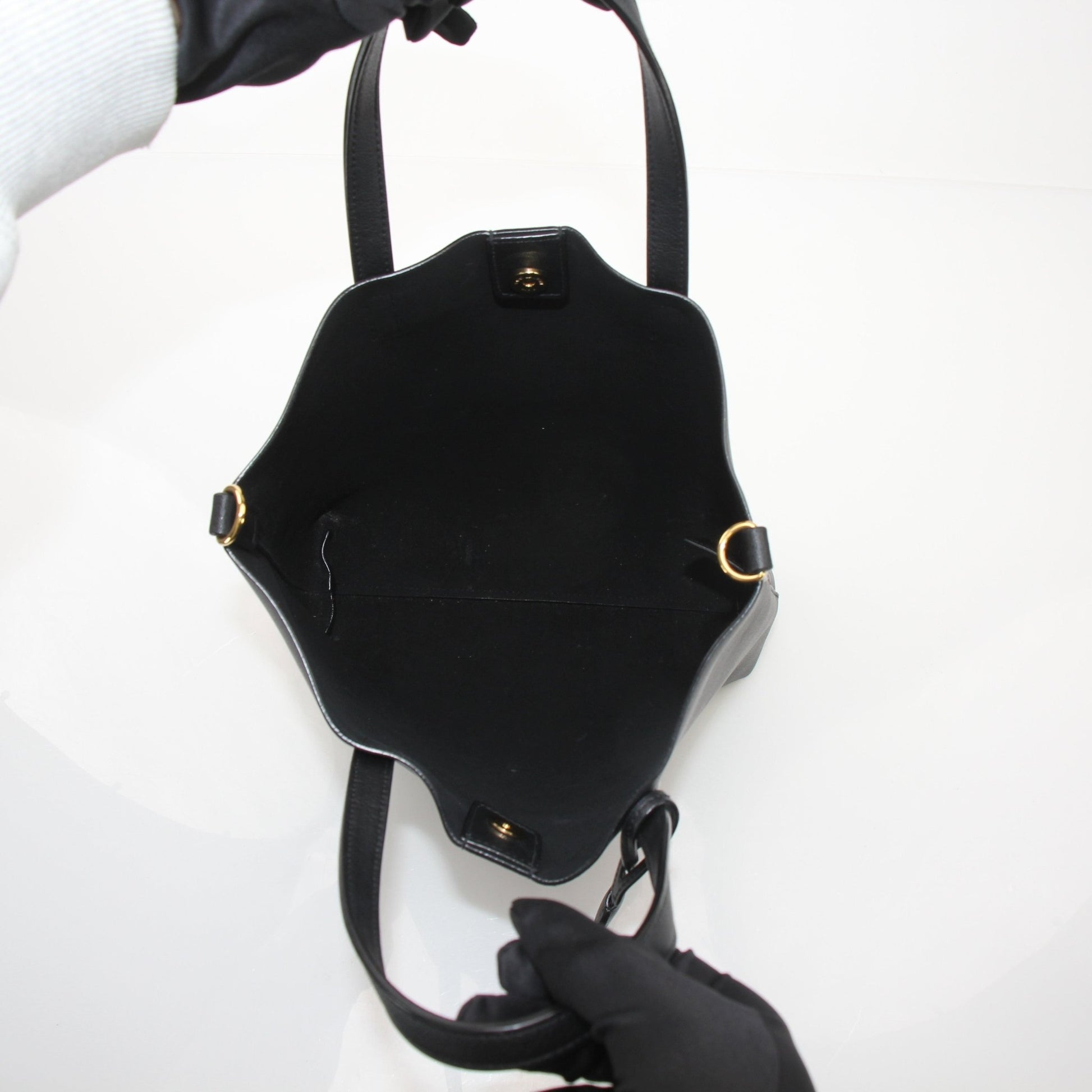 Gold & Beyond Saint Laurent Toy Shopping Tote handbag with gold-tone handles and structured design, casual and stylish for everyday use.
