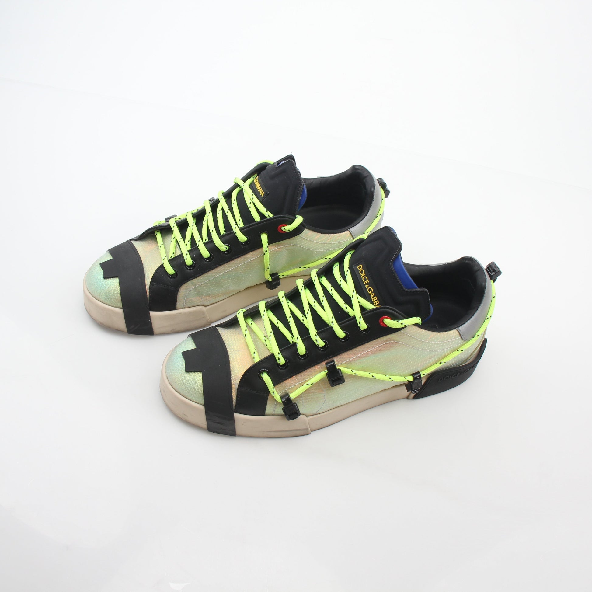 Dolce & Gabbana Neon Green Gold Portofino sneakers by Gold & Beyond, showcasing vibrant neon green and gold accents on shoes.