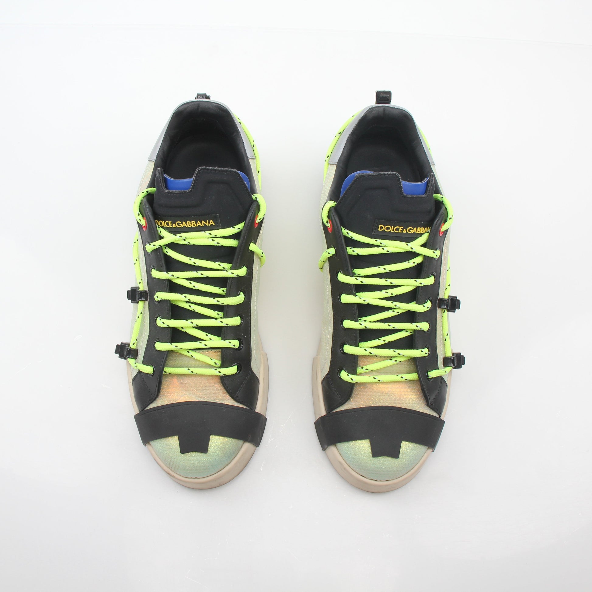Gold & Beyond neon green and gold Portofino sneakers with stylish design and branding, side view showing vibrant colors and details.