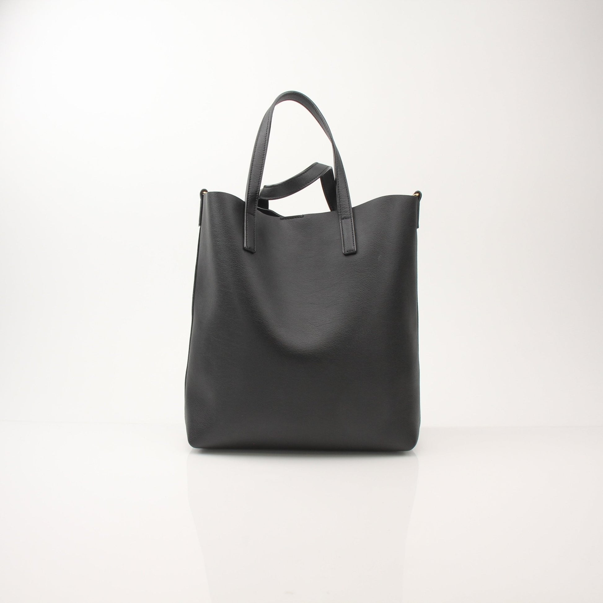 Gold & Beyond Saint Laurent Toy Shopping Tote handbag with black leather and gold-tone hardware, showing front view.