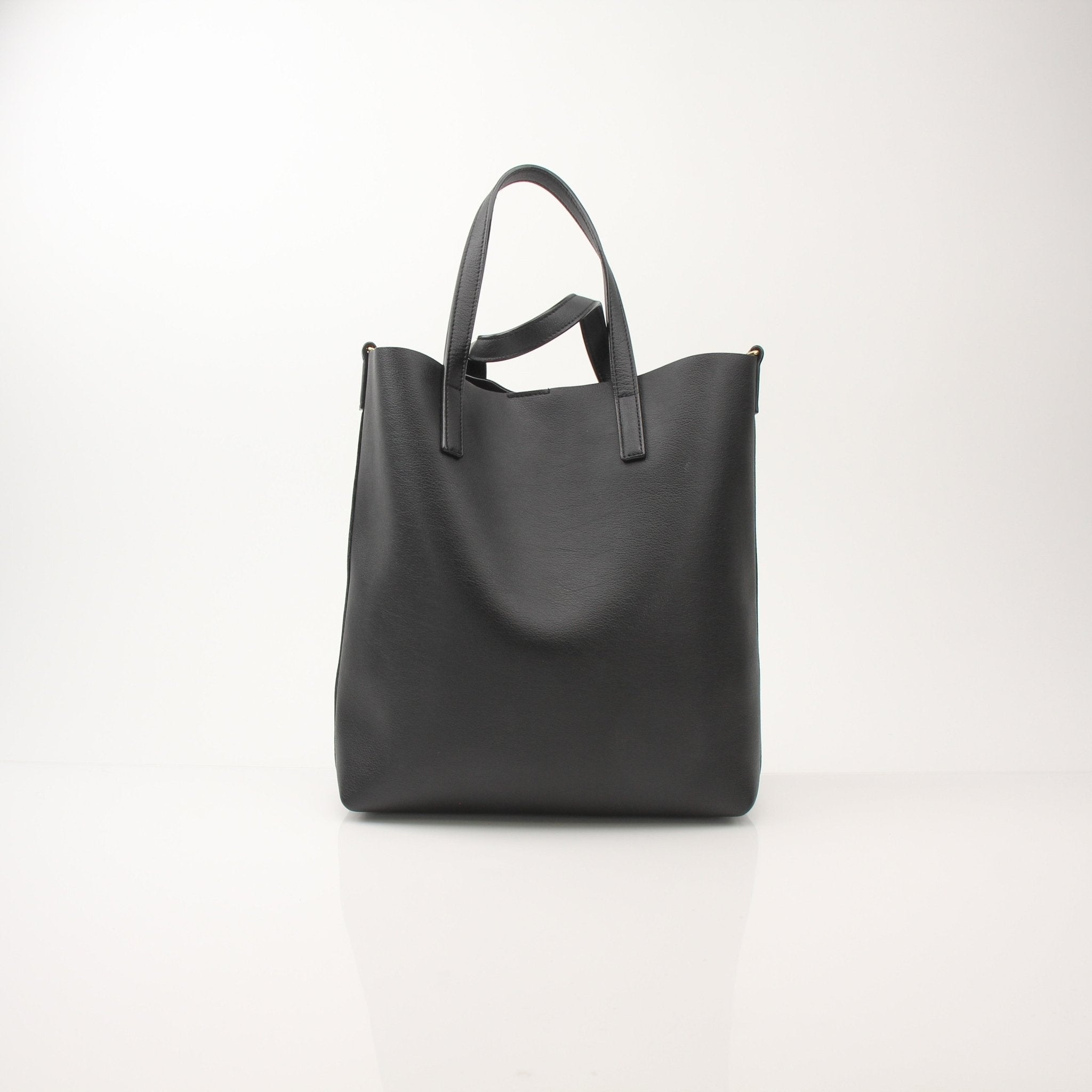 Gold & Beyond Saint Laurent Toy Shopping Tote handbag with black leather and gold-tone hardware, showing front view.