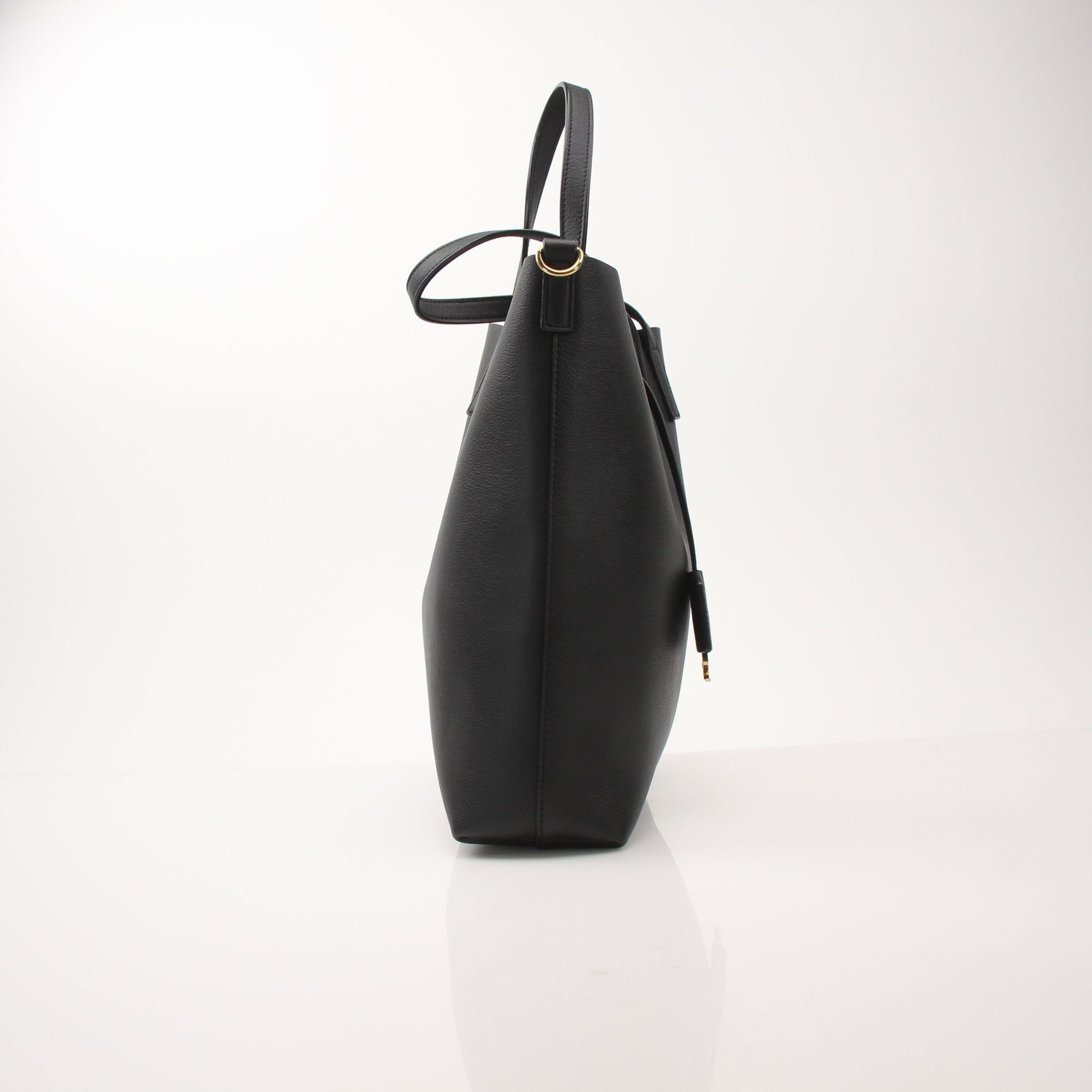 Gold & Beyond Saint Laurent Toy Shopping Tote handbag with gold chain strap and playful toy-inspired design.