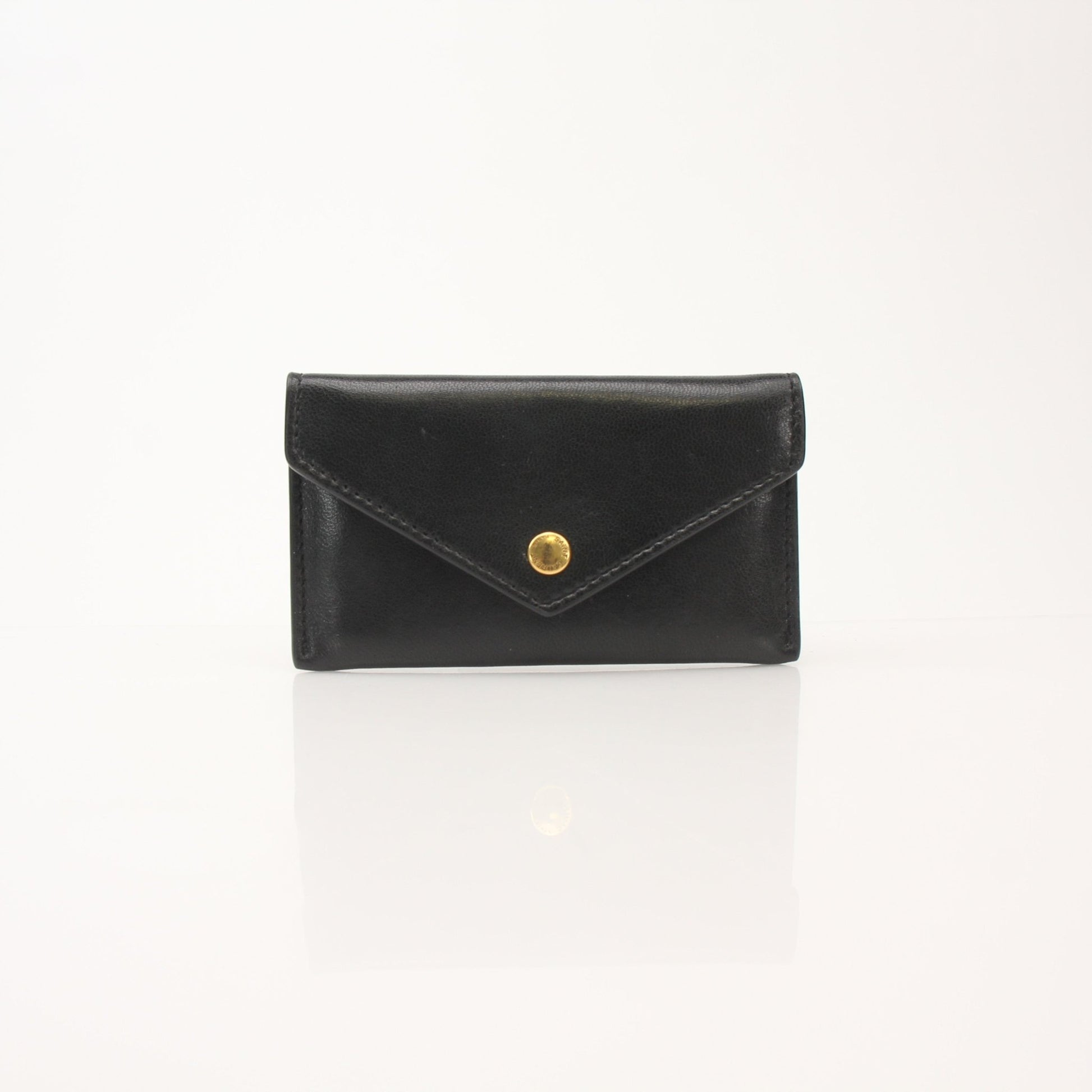Saint Laurent Loulou lambskin card holder with gold-tone hardware, featuring compact design and multiple card slots.
