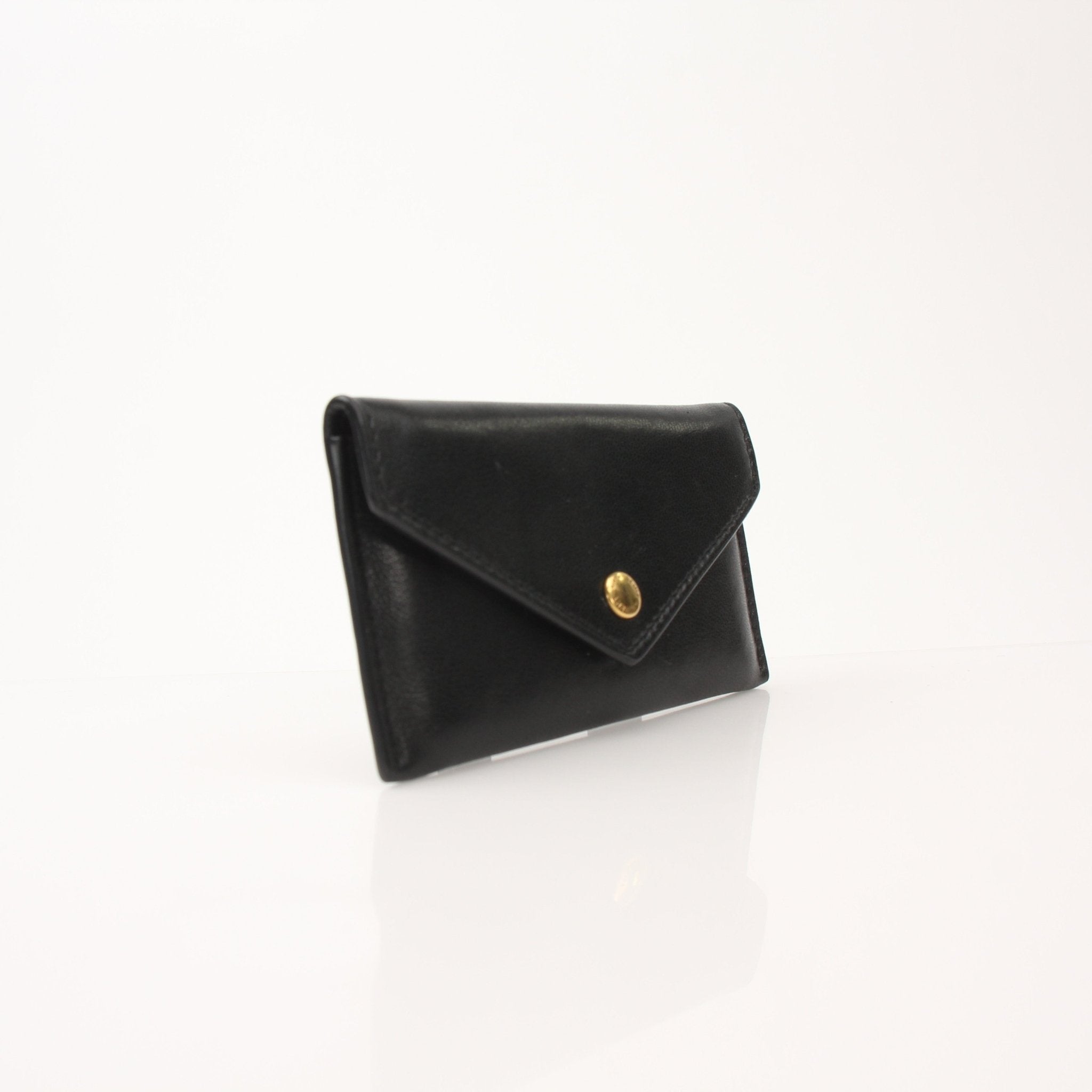 Saint Laurent Loulou lambskin card holder with gold-tone hardware, compact and stylish for everyday use.