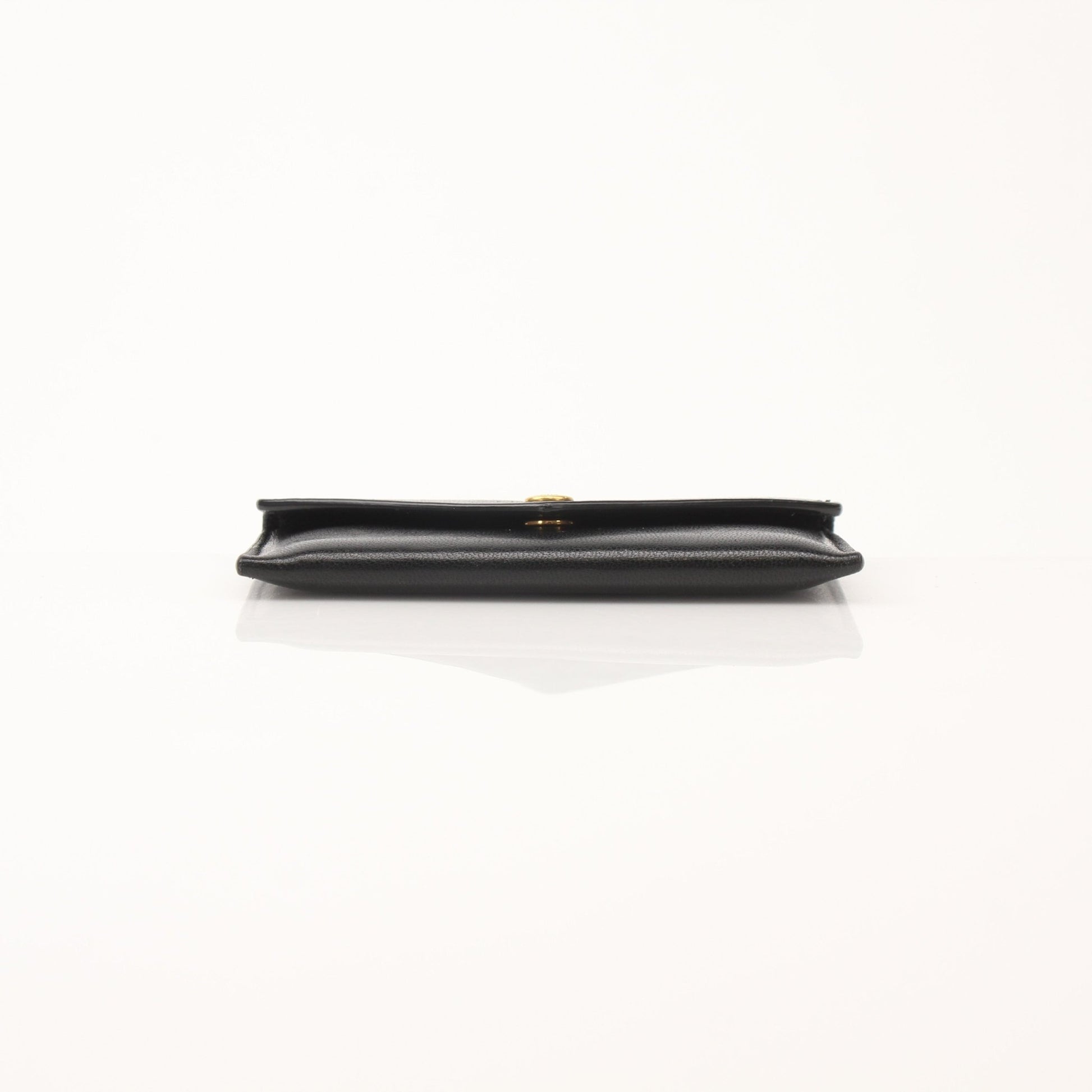 Saint Laurent Loulou lambskin card holder with gold-tone hardware and multiple card slots, stylish and compact accessory.
