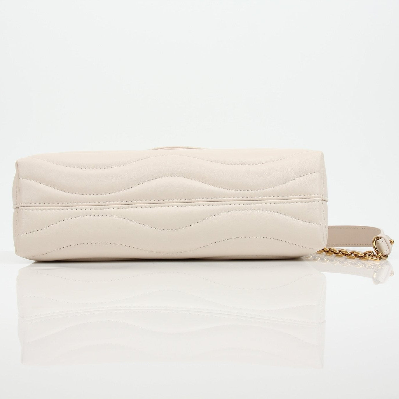 Louis Vuitton New Wave cream chain handbag by Gold & Beyond, featuring a stylish cream leather design with gold chain straps.