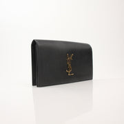 Saint Laurent YSL Grain de Poudre Kate Clutch shoes in gold with textured grain finish, featuring a sleek, elegant design.