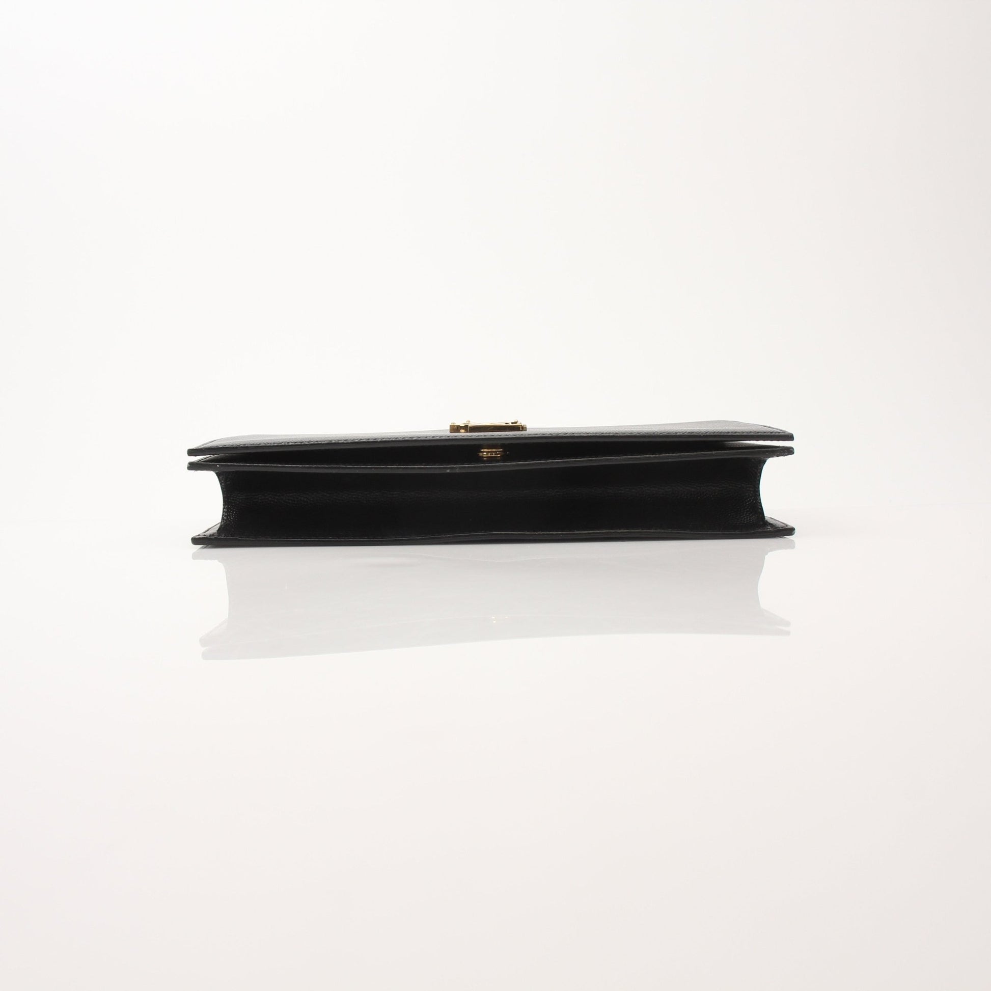 Gold & Beyond Saint Laurent Grain de Poudre Kate clutch, elegant shoes with textured grain detail and classic design.