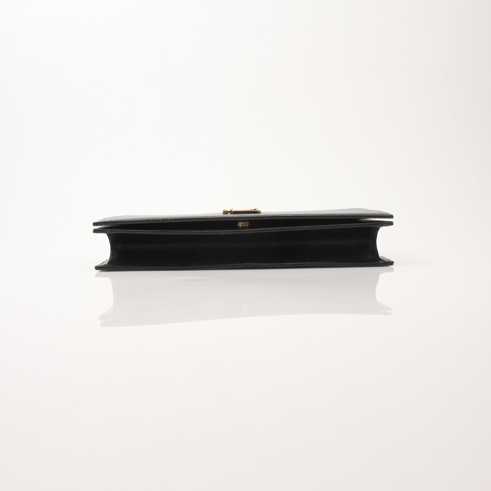 Gold & Beyond Saint Laurent Grain de Poudre Kate clutch, elegant shoes with textured grain detail and classic design.