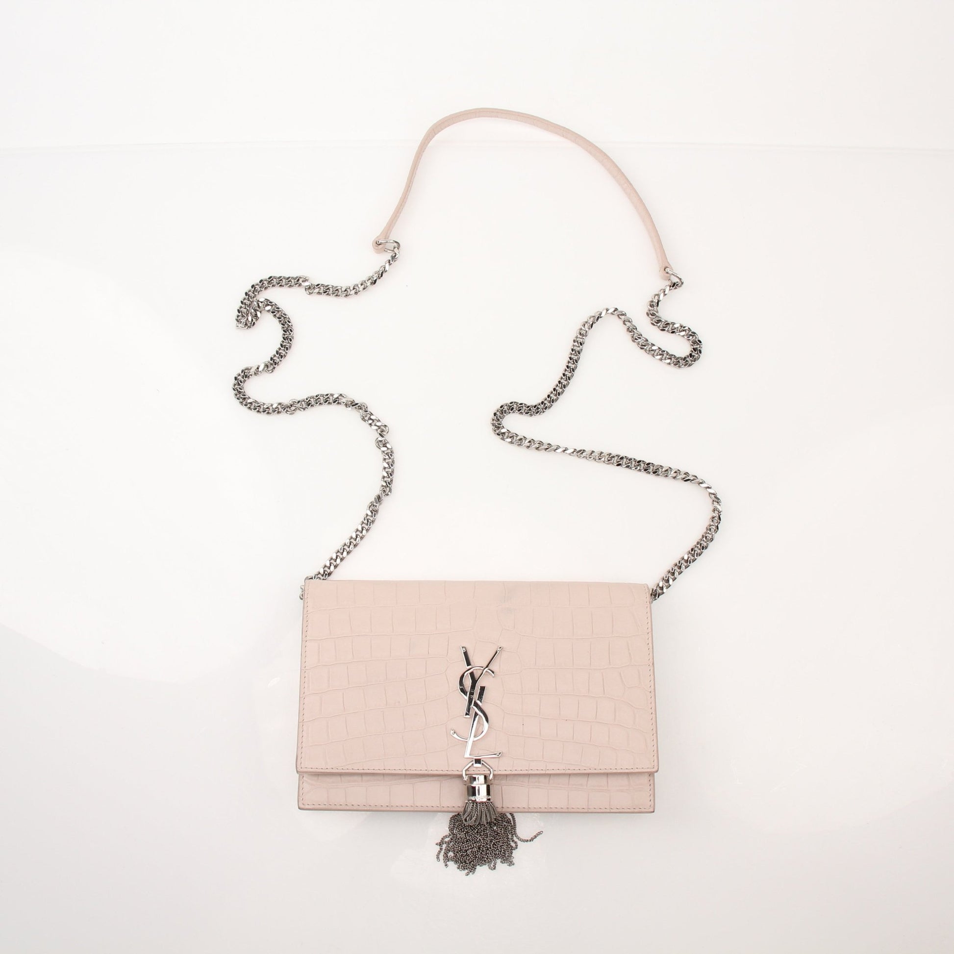 Gold & Beyond Saint Laurent Kate Tassel Chain Wallet handbag with tassels, chain strap, and sleek design on a neutral background.
