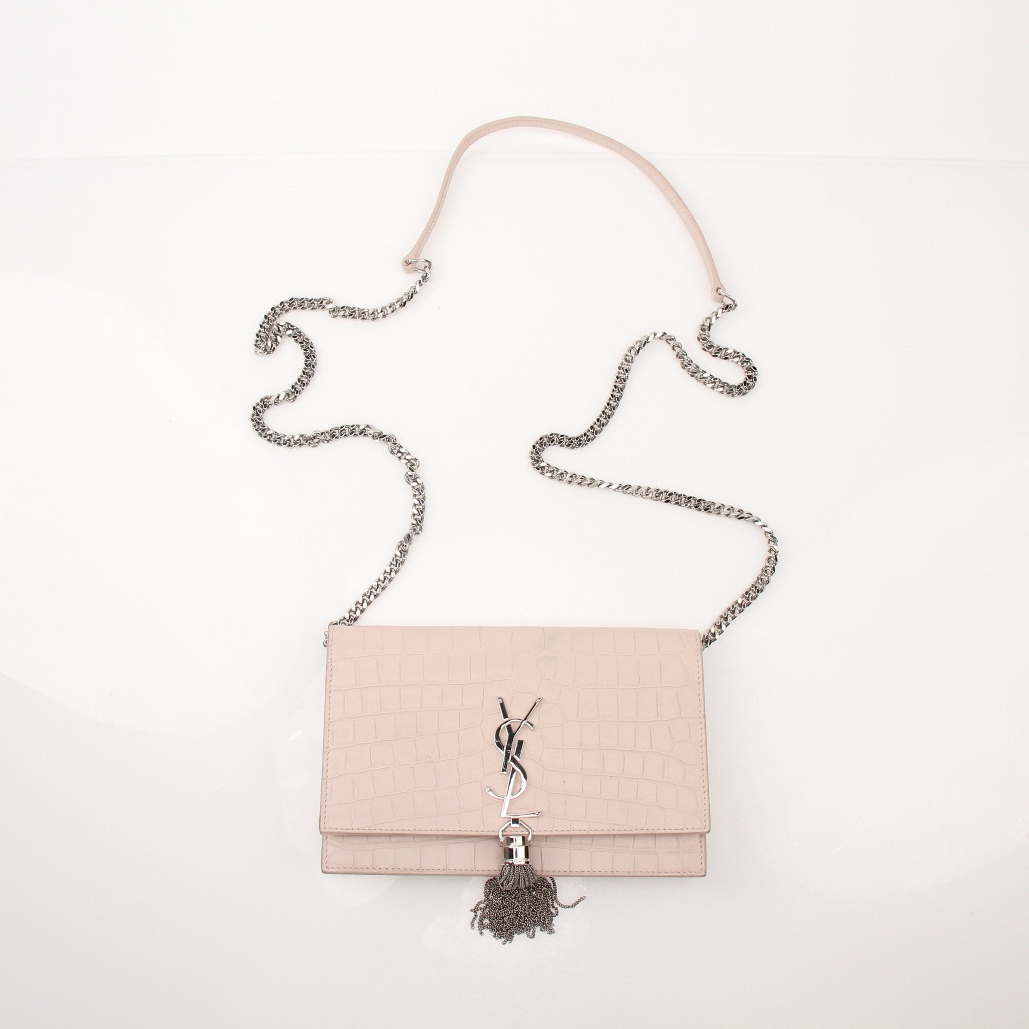 Gold & Beyond Saint Laurent Kate Tassel Chain Wallet handbag with tassels, chain strap, and sleek design on a neutral background.