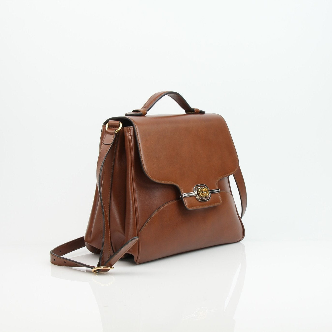 Gucci Pienza brown leather messenger handbag with gold hardware, featuring adjustable strap and stylish design.