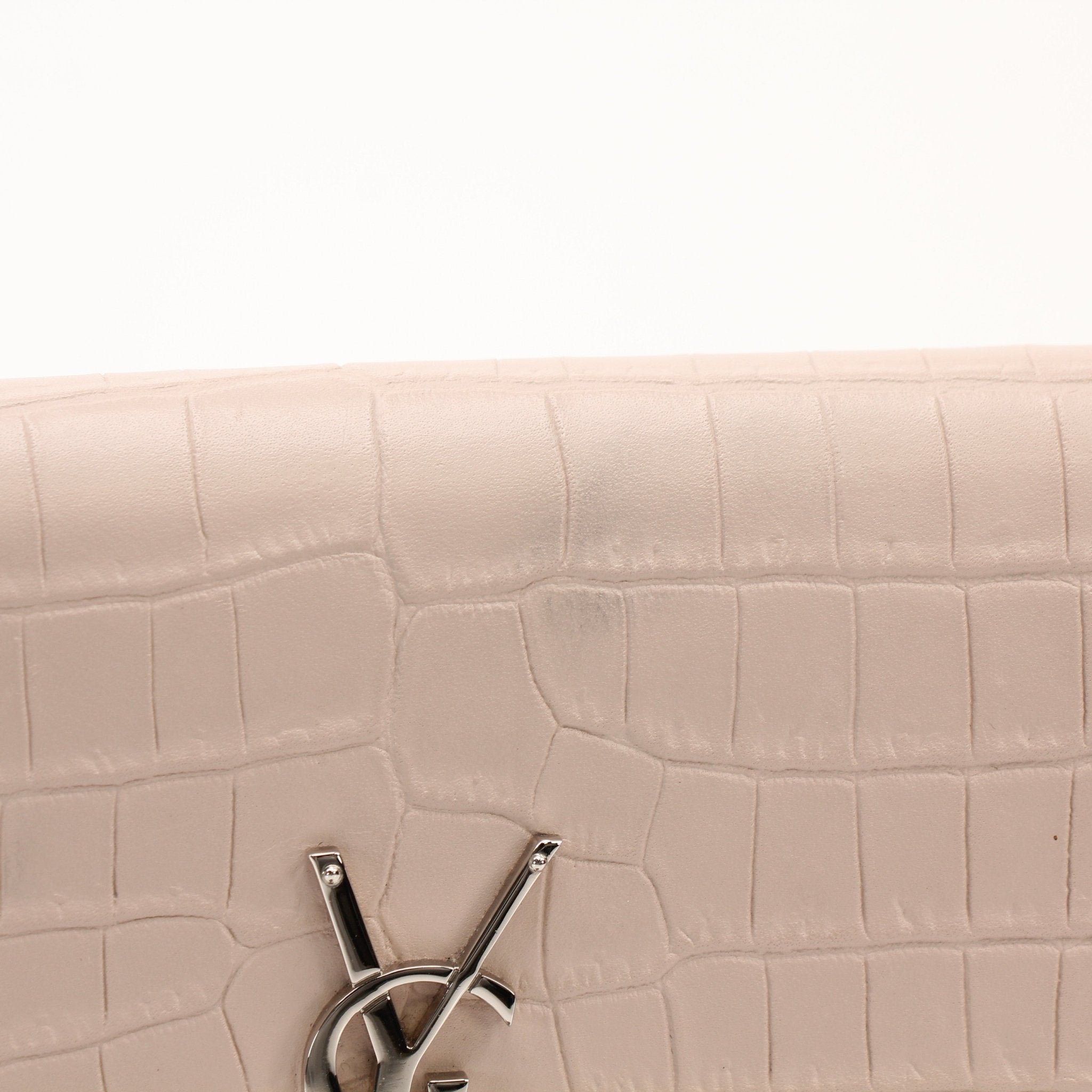 Saint Laurent Kate Tassel Chain Wallet handbag with gold chain and tassel detail, black leather exterior, and compact design.