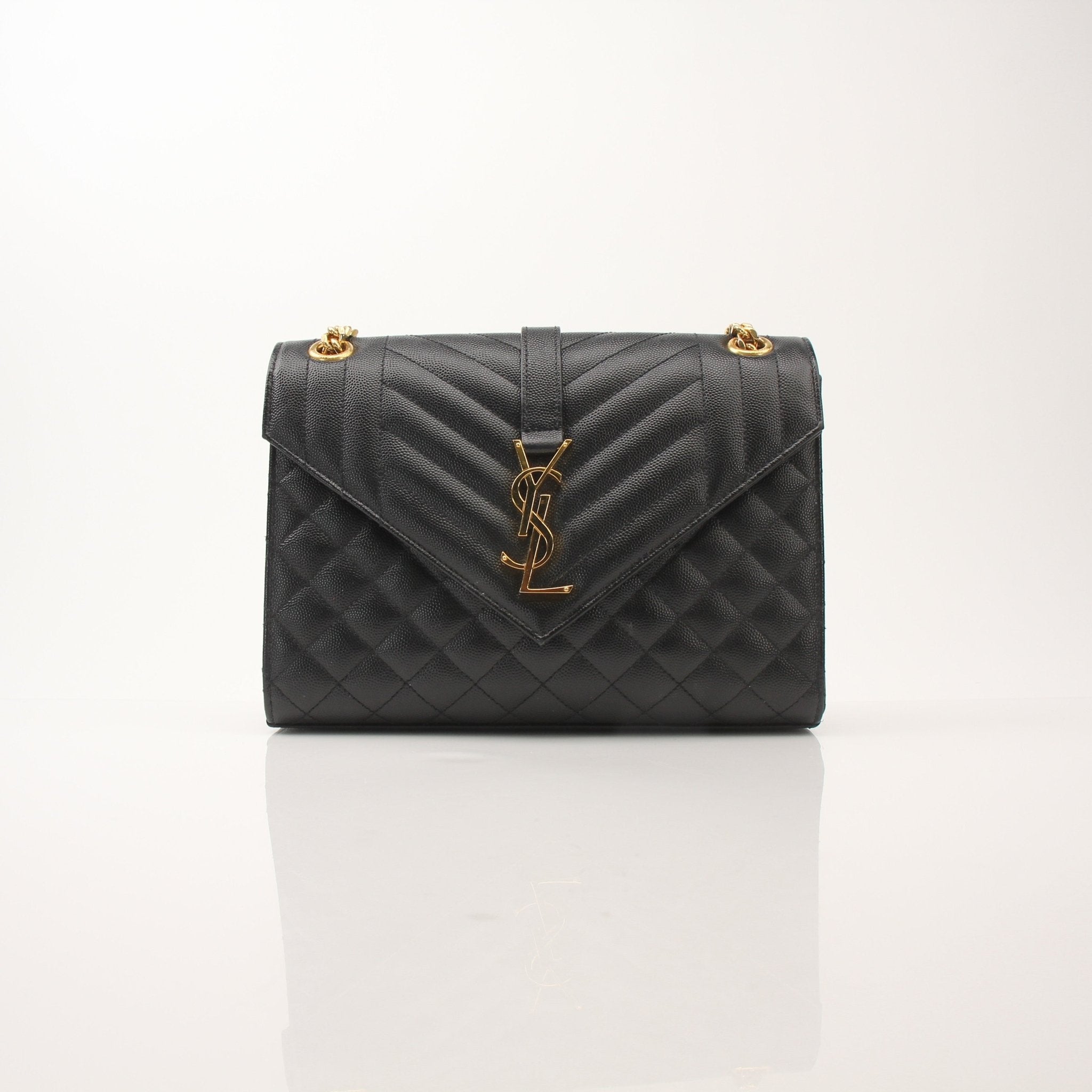 Gold & Beyond Saint Laurent Envelope Triquilt grained leather shoulder handbag with flap closure and gold-tone hardware.