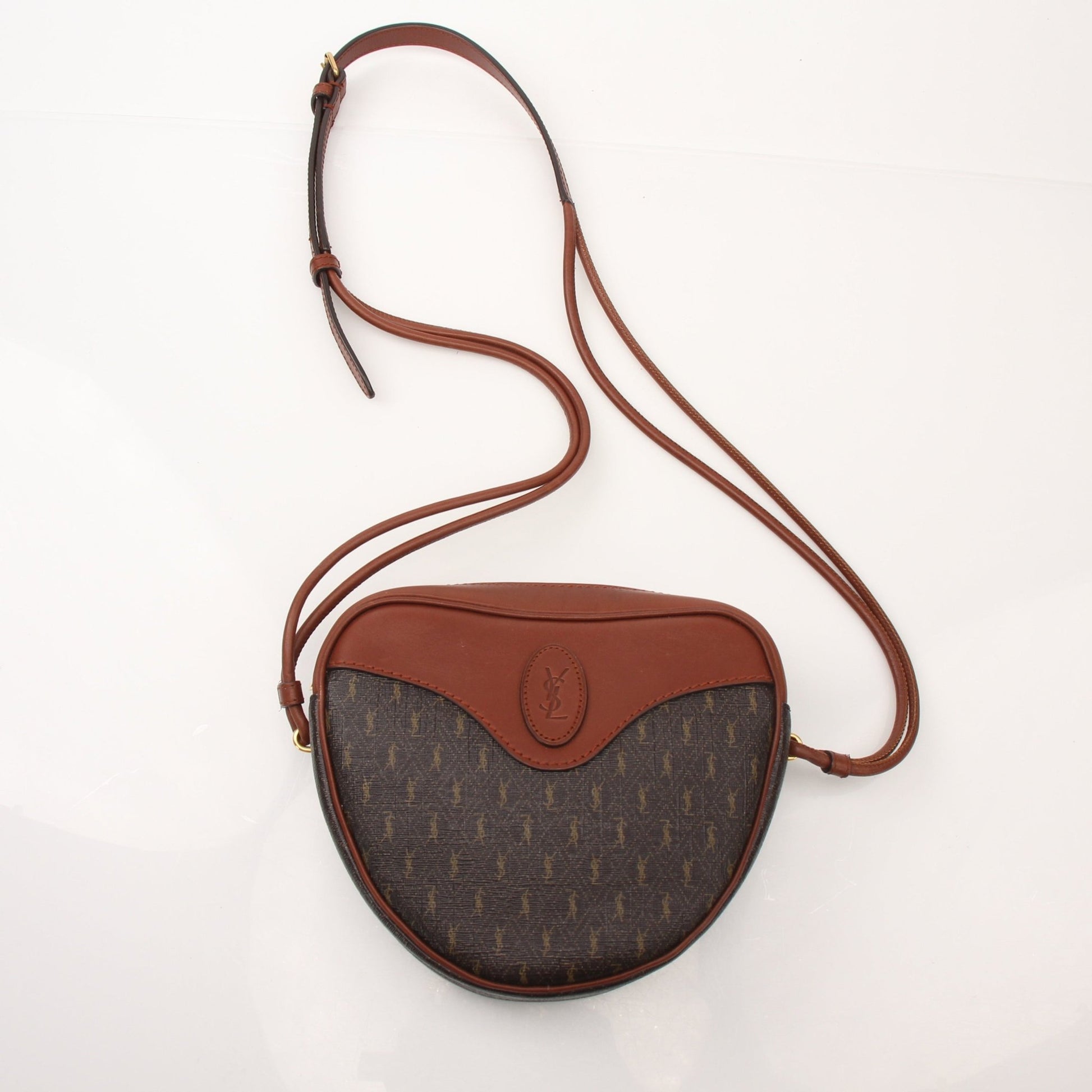 Gold & Beyond Saint Laurent Le Monogramme Heart YSL crossbody handbag with gold-tone hardware and monogram logo, featuring a heart-shaped design.