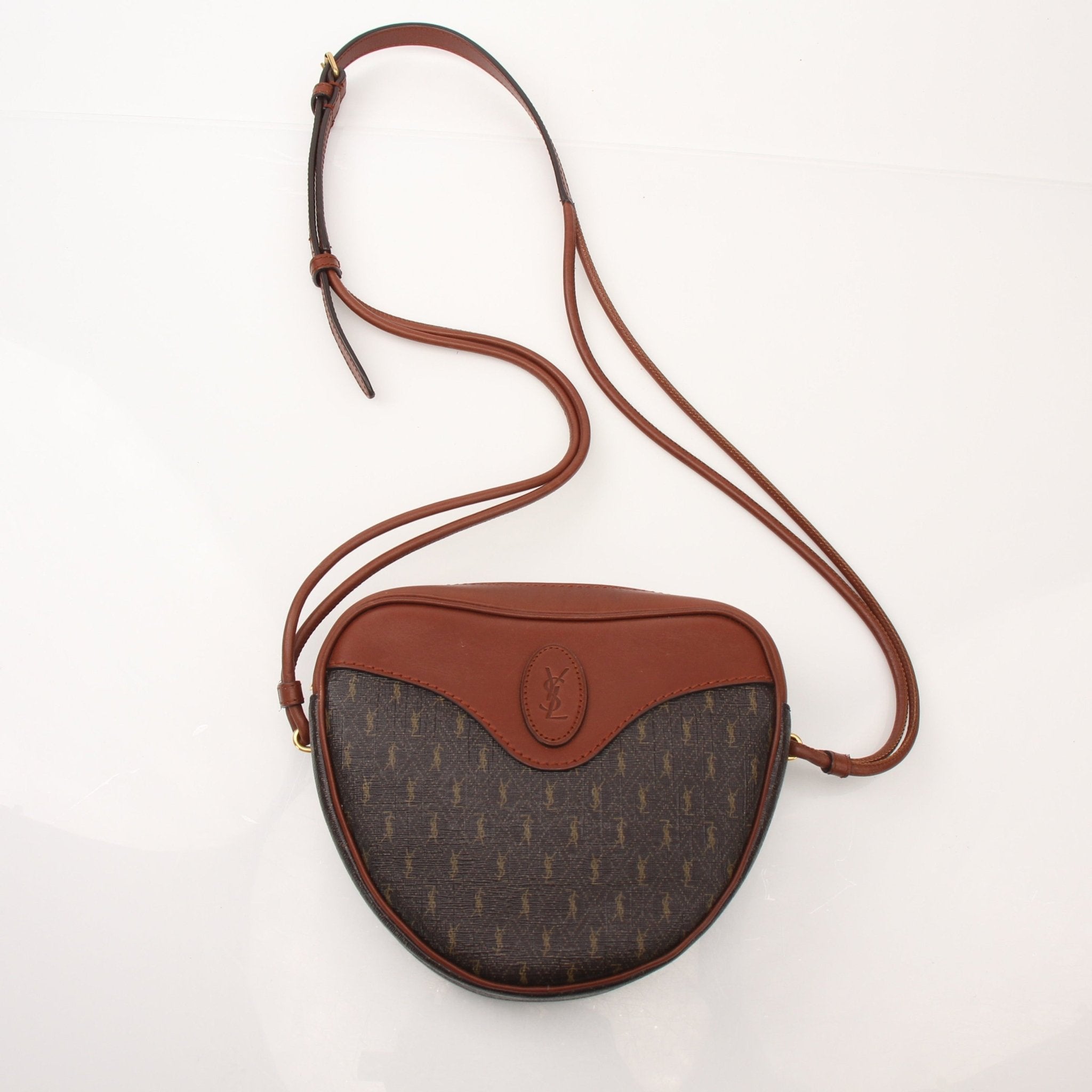 Gold & Beyond Saint Laurent Le Monogramme Heart YSL crossbody handbag with gold-tone hardware and monogram logo, featuring a heart-shaped design.