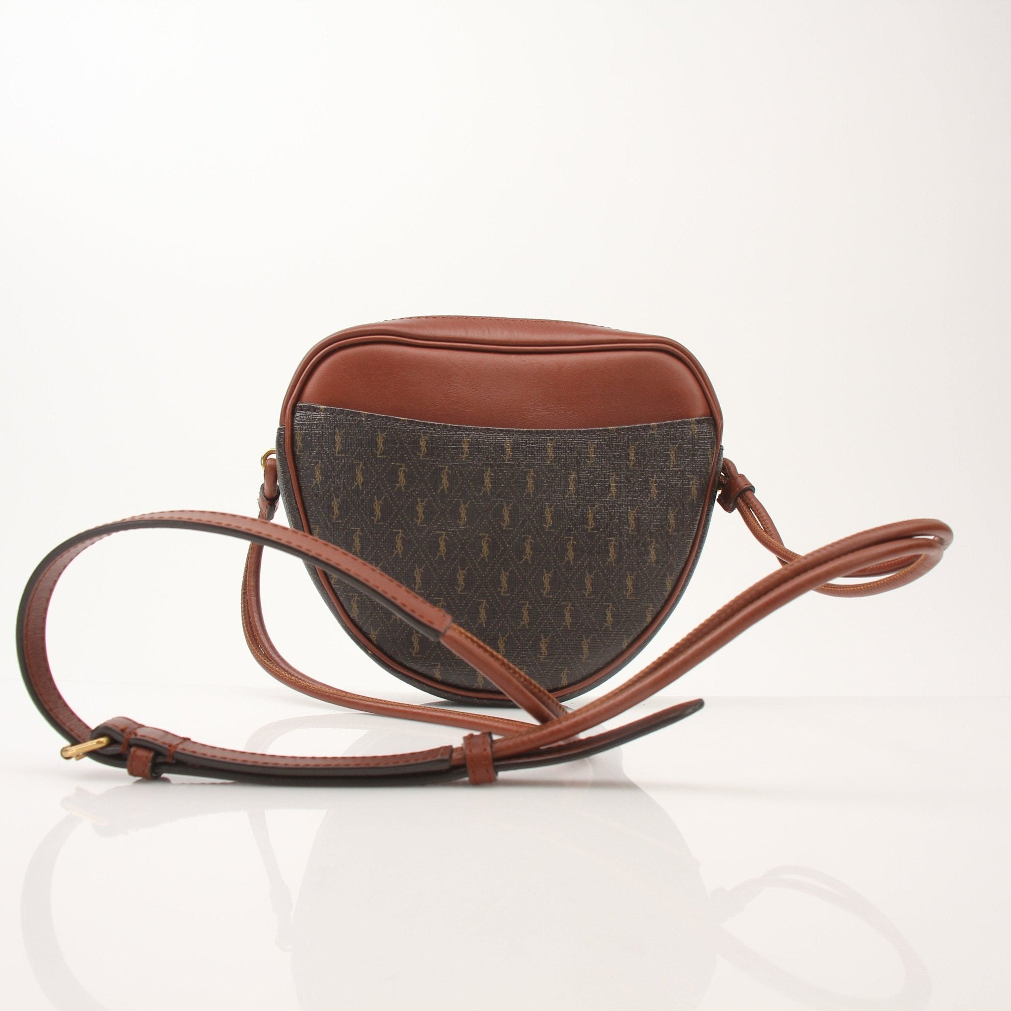Gold & Beyond Saint Laurent Le Monogramme Heart YSL Crossbody Bag with gold chain strap and signature monogram design.