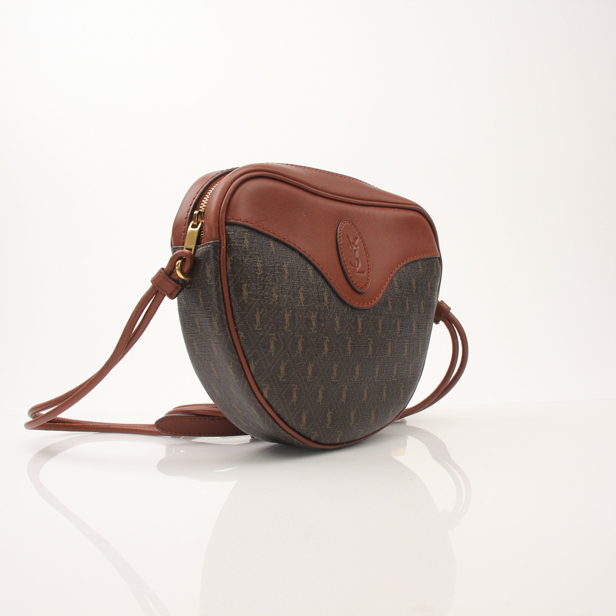 Gold & Beyond Saint Laurent Le Monogramme Heart YSL crossbody handbag with monogram design and heart-shaped detail.