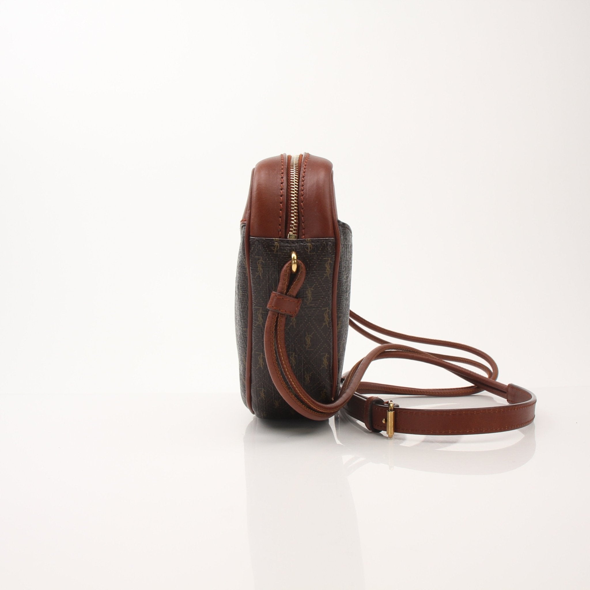 Gold & Beyond Saint Laurent Le Monogramme Heart YSL crossbody handbag with gold hardware and monogrammed design.