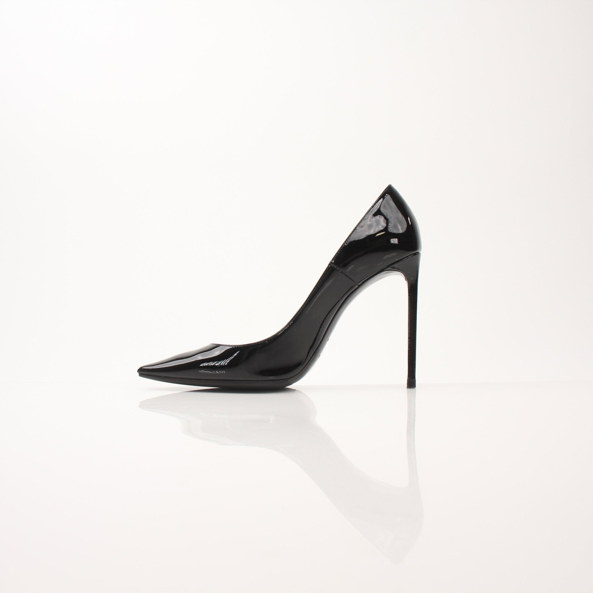 Gold & Beyond Saint Laurent Women’s Anja Pumps heels, stylish black leather footwear with pointed toes and elegant design.