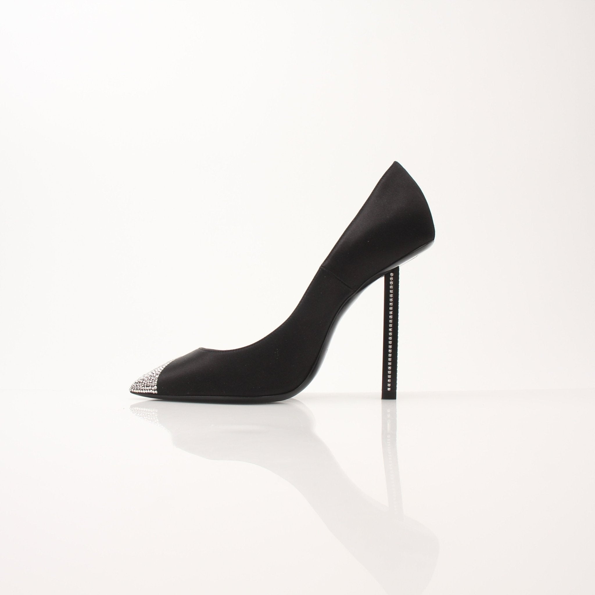 Gold & Beyond Saint Laurent Women's Tower 110 Pumps, elegant high-heeled shoes with pointed toes and sleek design.