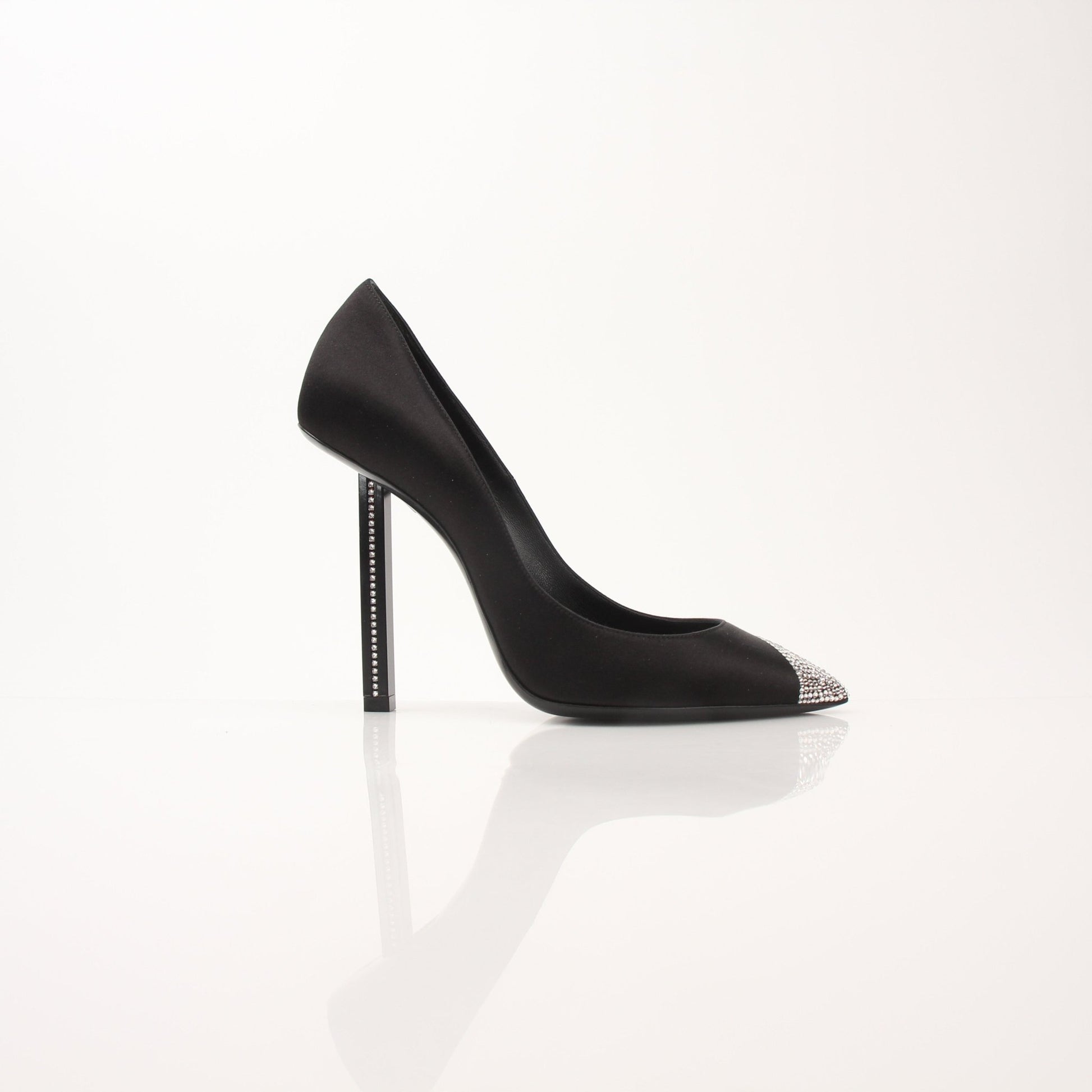Gold & Beyond Saint Laurent Women’s Tower 110 Pumps, stylish high-heeled shoes with pointed toes and sleek design.
