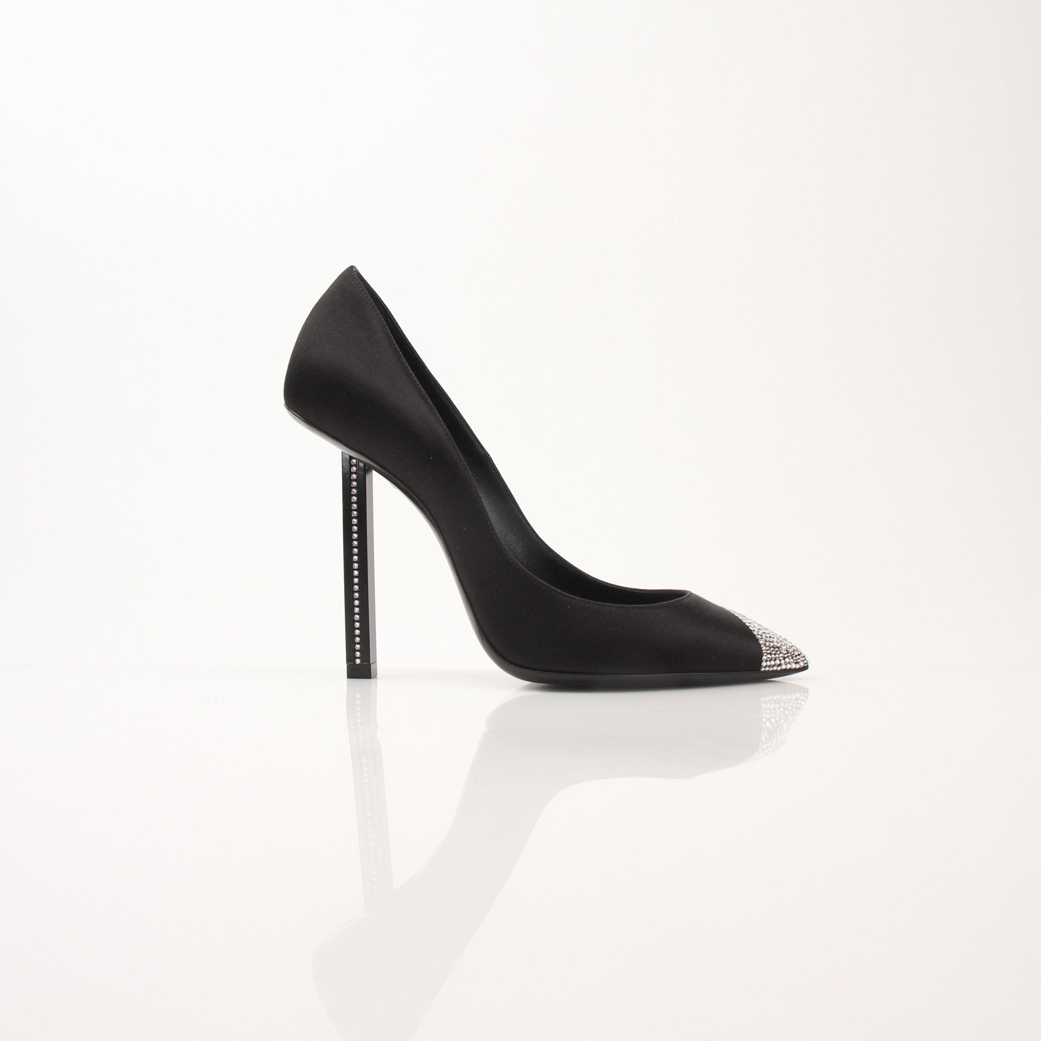 Gold & Beyond Saint Laurent Women’s Tower 110 Pumps, stylish high-heeled shoes with pointed toes and sleek design.