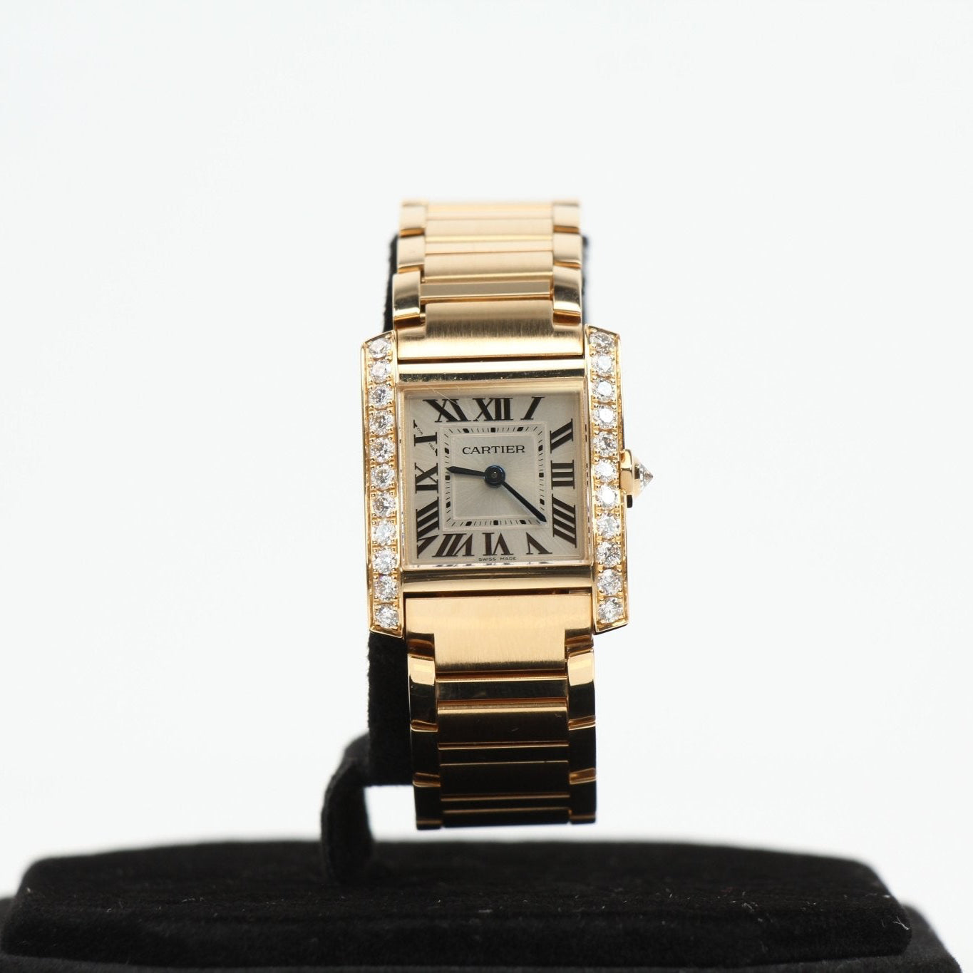 Gold & Beyond Cartier Tank Française diamond watch with rectangular gold case and elegant black leather strap.