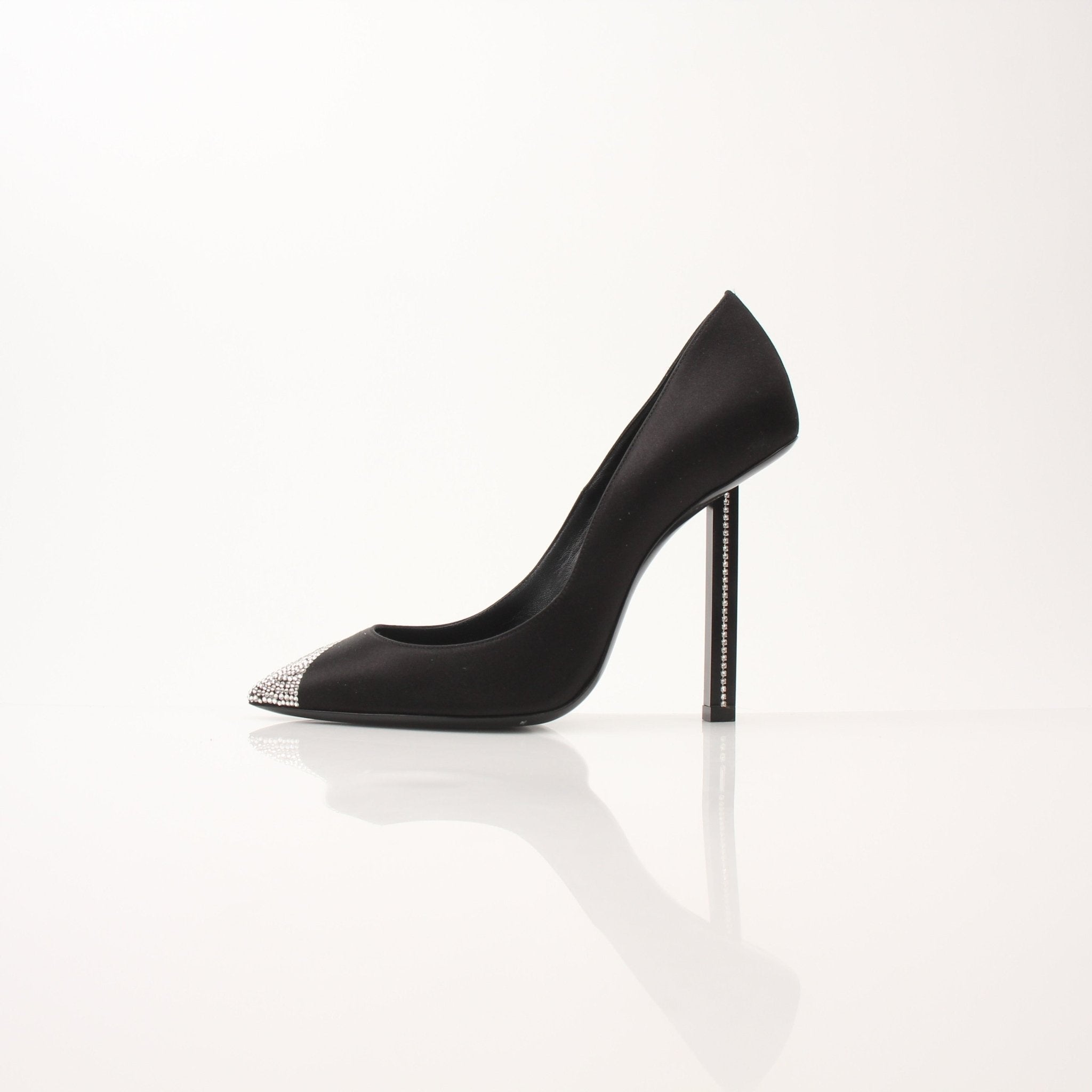 Gold & Beyond Saint Laurent Women’s Tower 110 Pumps shoes, featuring sleek black leather and pointed toes.