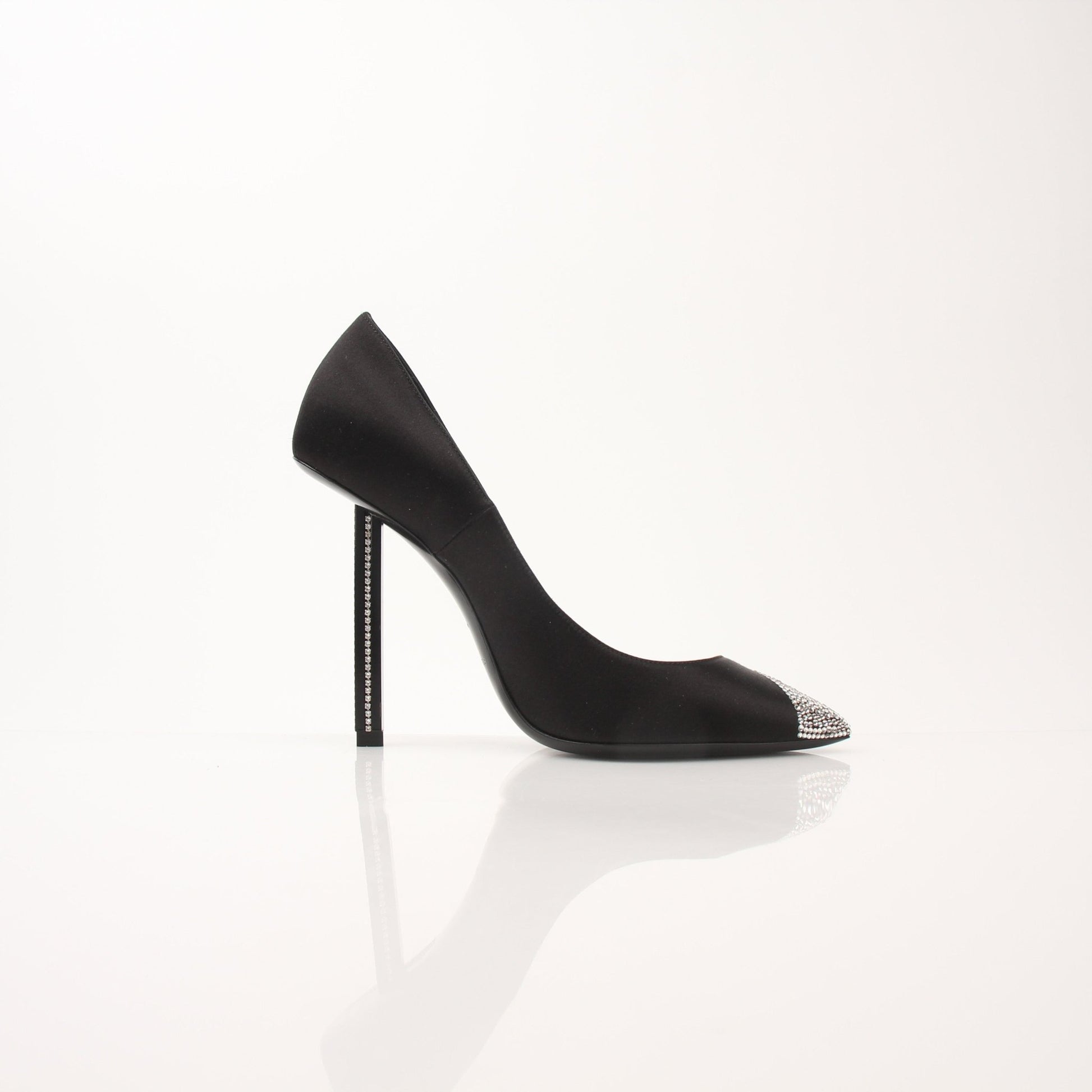 Gold & Beyond Saint Laurent Women’s Tower 110 Pumps showing sleek black leather shoes with pointed toes and stiletto heels.