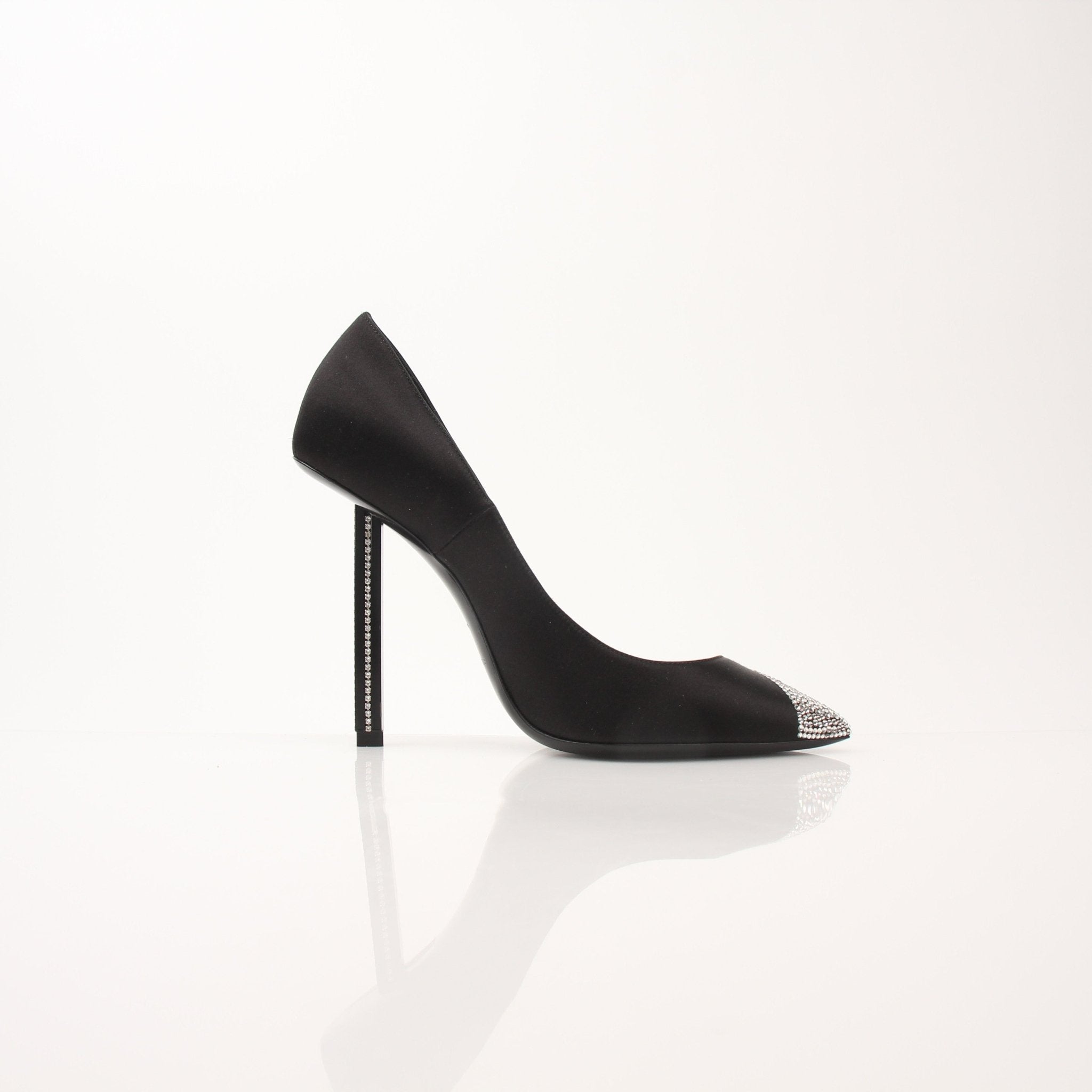 Gold & Beyond Saint Laurent Women’s Tower 110 Pumps showing sleek black leather shoes with pointed toes and stiletto heels.