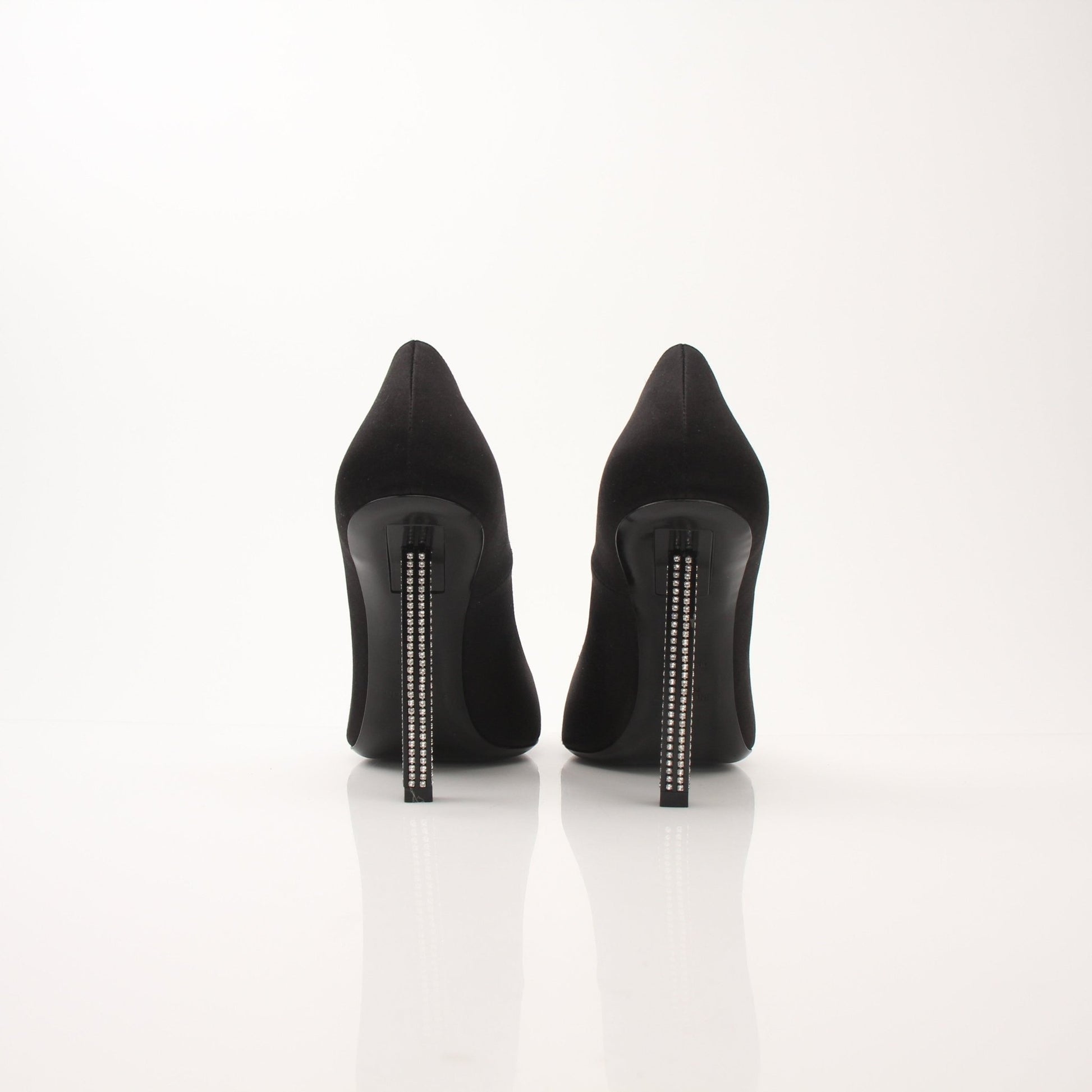 Gold & Beyond Saint Laurent Women’s Tower 110 Pumps shoes with elegant pointed toe and sleek design, shown from a side angle.
