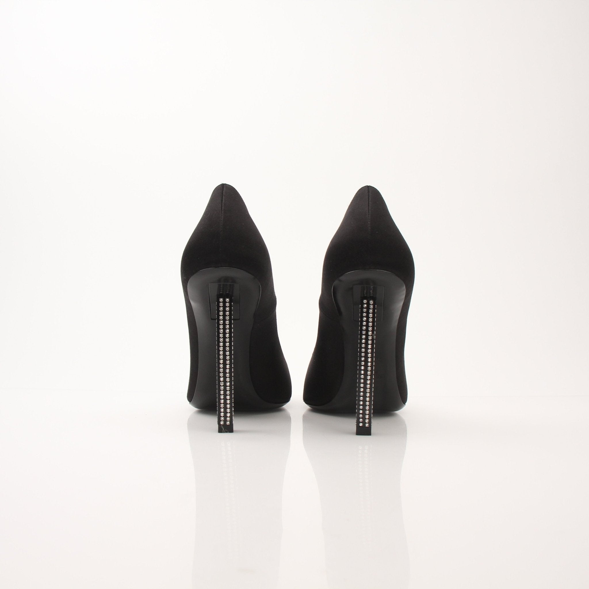 Gold & Beyond Saint Laurent Women’s Tower 110 Pumps shoes with elegant pointed toe and sleek design, shown from a side angle.