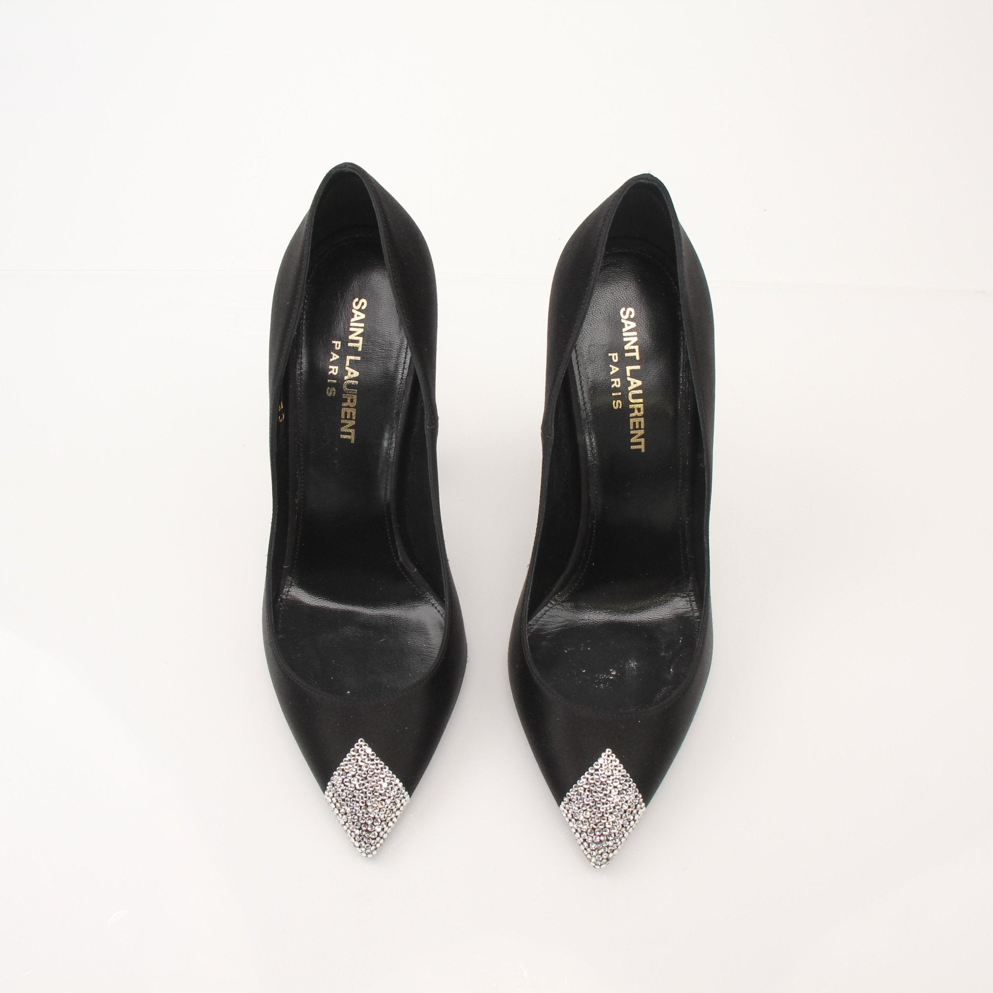 Gold & Beyond Saint Laurent Women’s Tower 110 Pumps shoes, featuring sleek design and pointed toes, displayed on a white background.