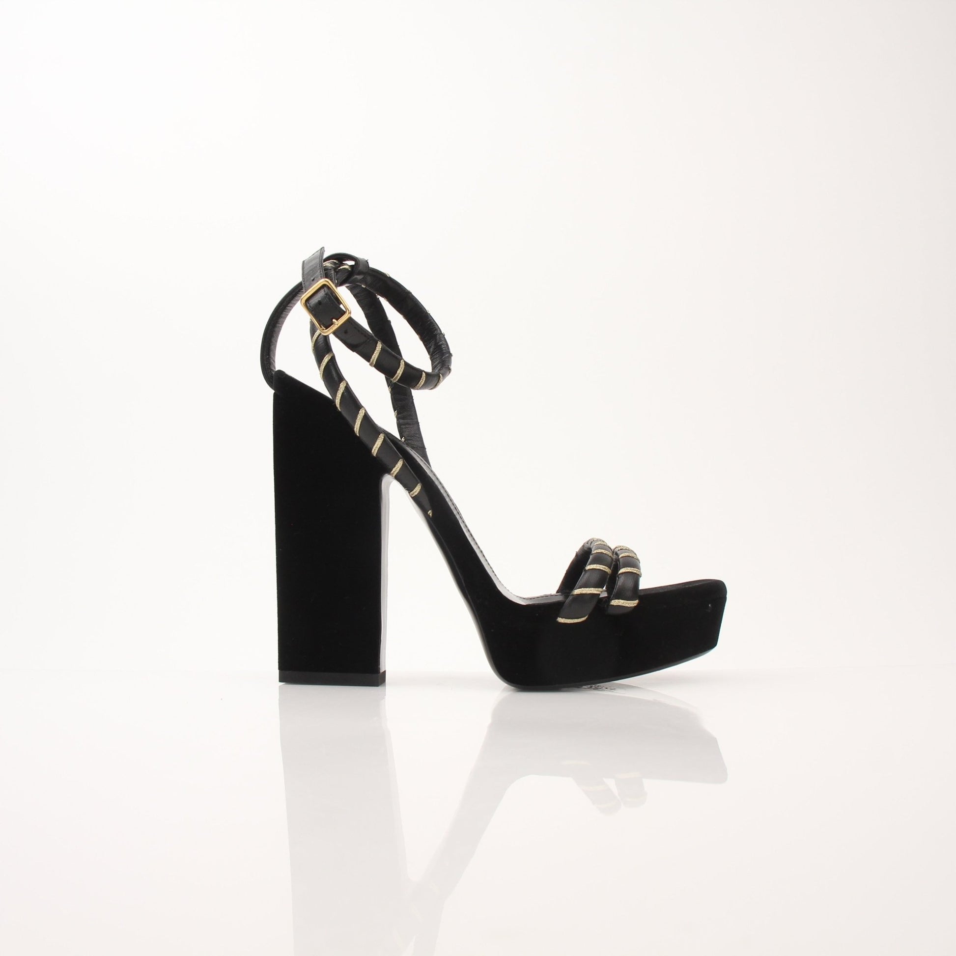 Gold & Beyond Saint Laurent women’s Debbie ankle strap platform heels with open toe and high block heel, black leather finish.