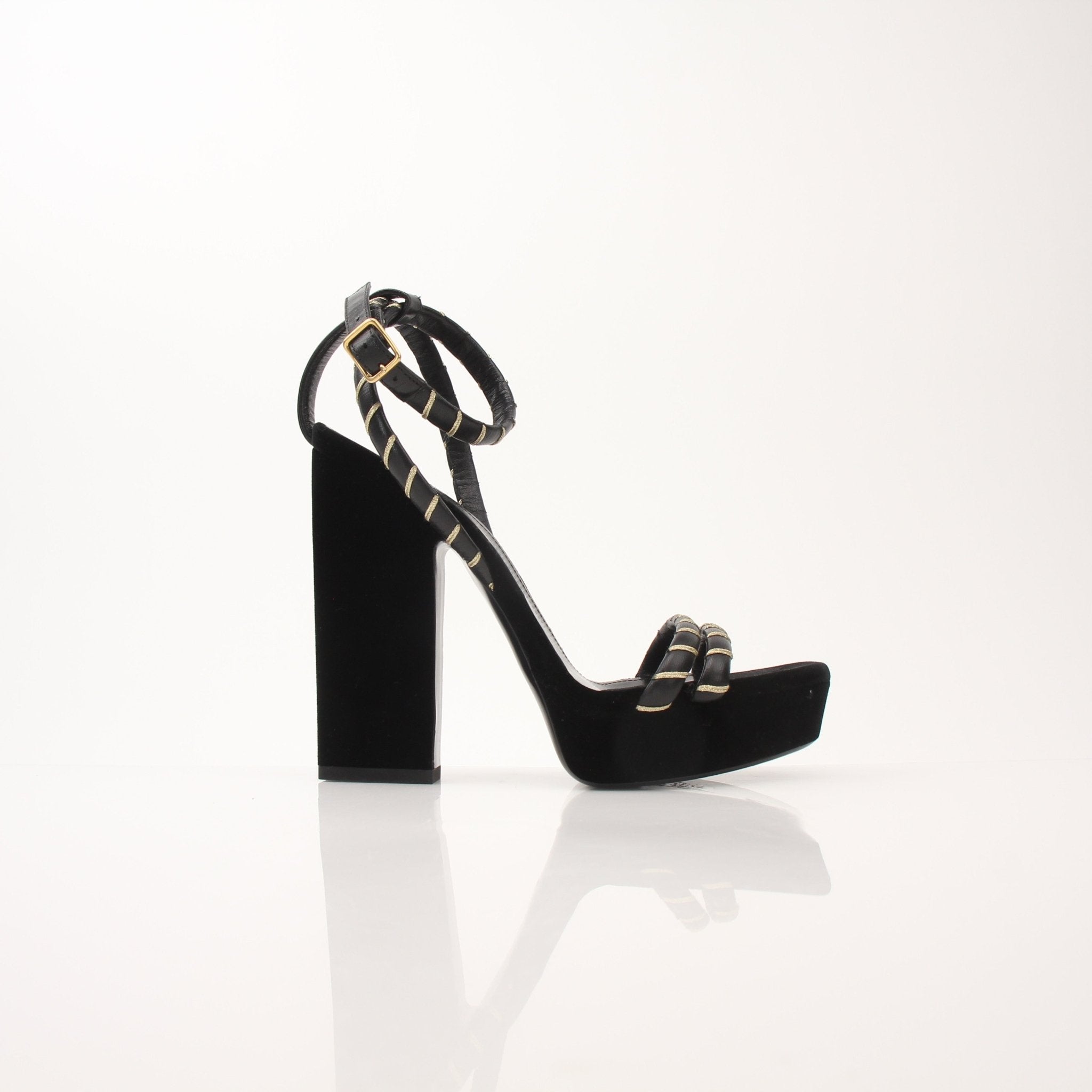 Gold & Beyond Saint Laurent women’s Debbie ankle strap platform heels with open toe and high block heel, black leather finish.