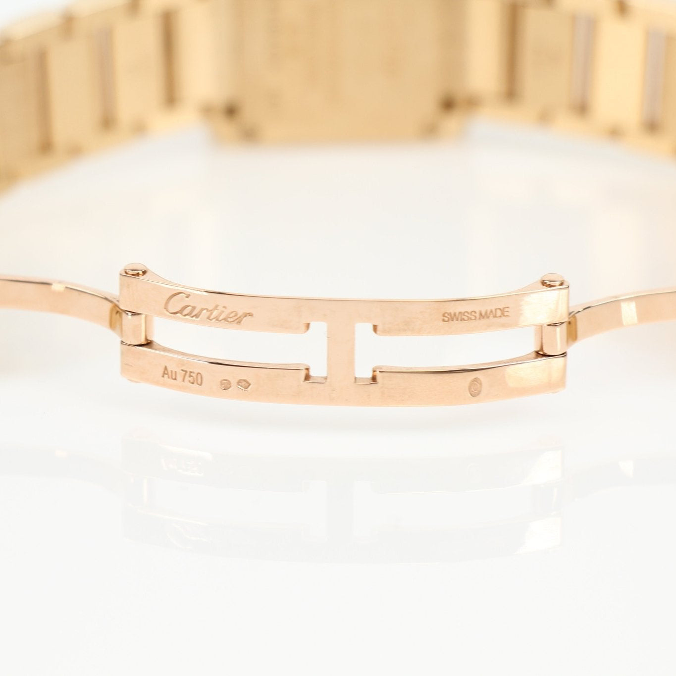 Cartier Tank Française diamond watch featuring a gold bracelet and rectangular face, elegant and luxurious timepiece.
