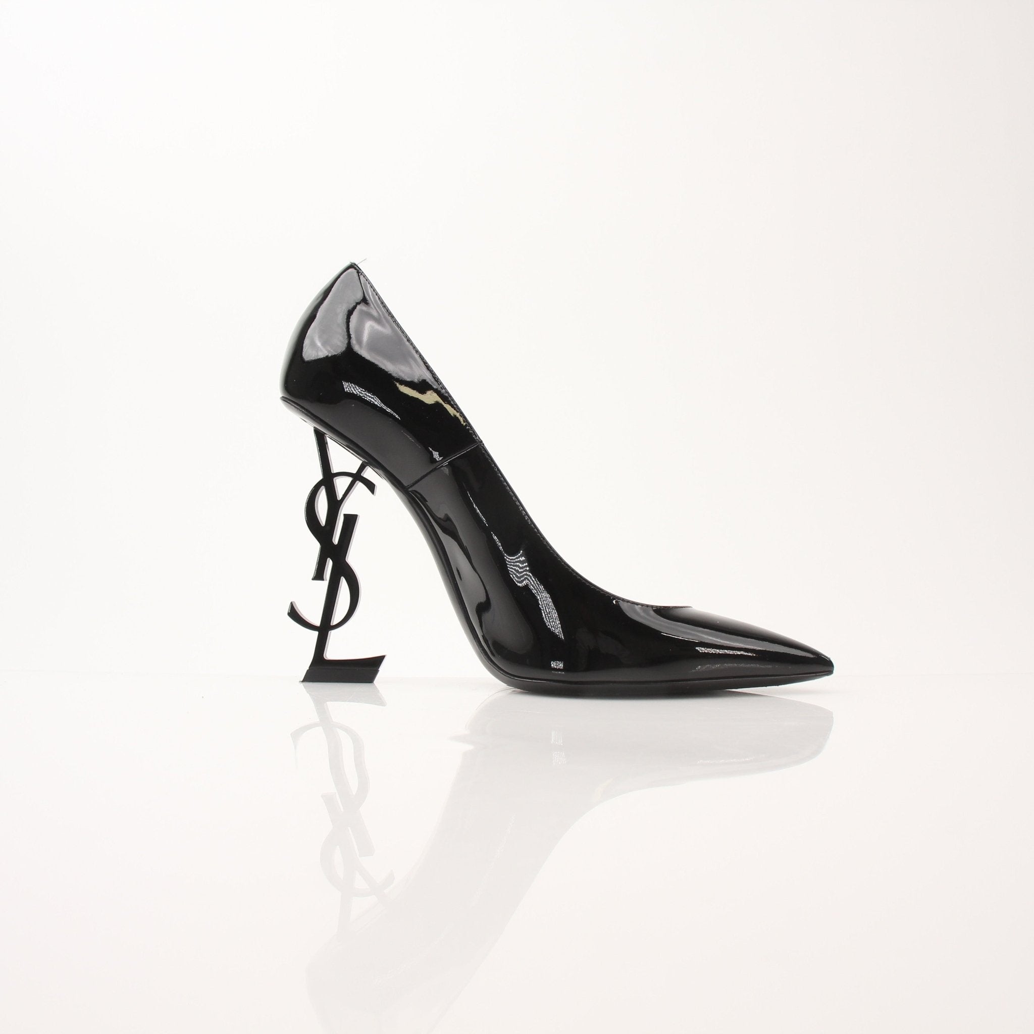 Gold & Beyond Saint Laurent Opyum 110 pumps, stylish women’s heels with sleek design and pointed toes, on a neutral background.