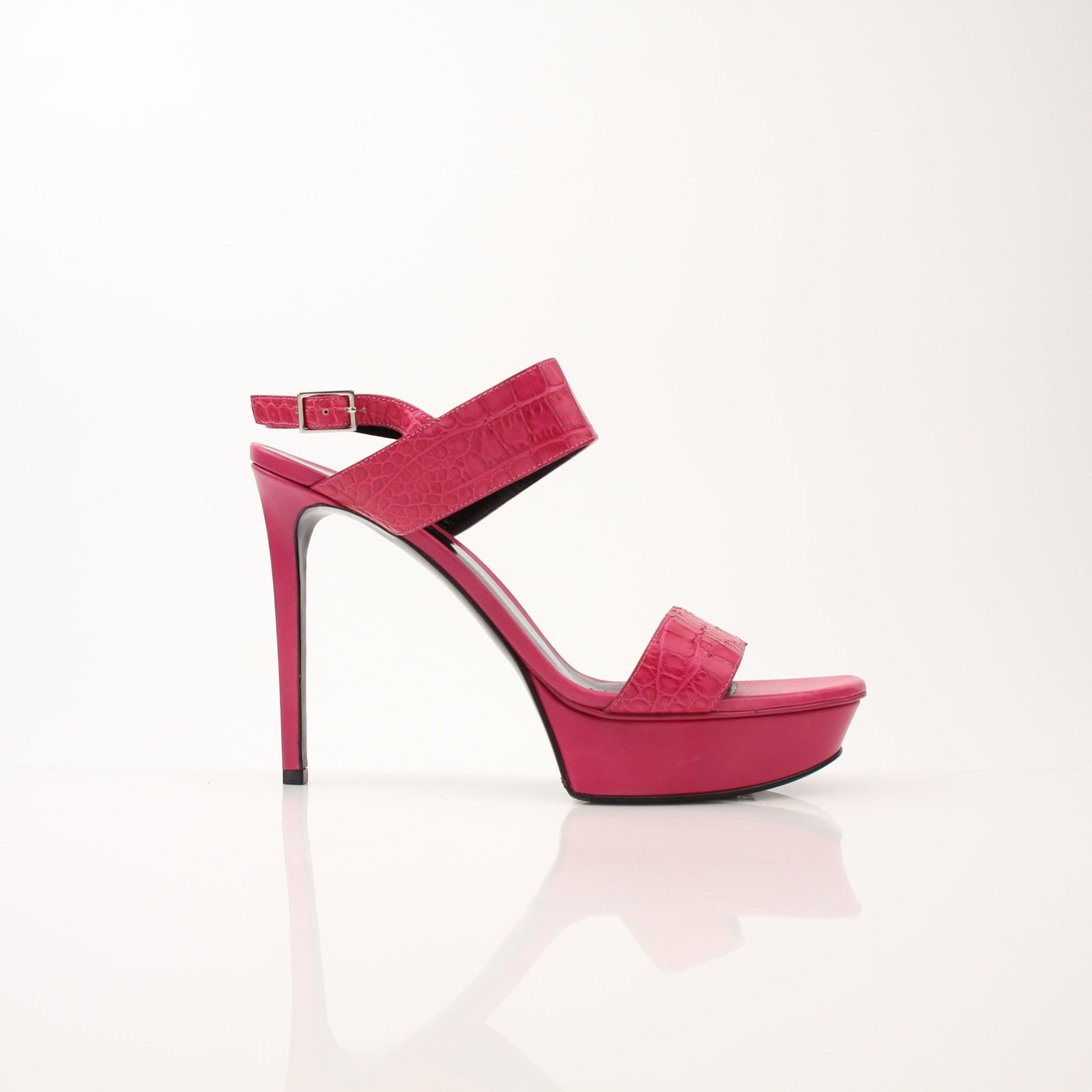 Gold & Beyond women's Saint Laurent platform sandals with high heels, featuring sleek design and strappy details.