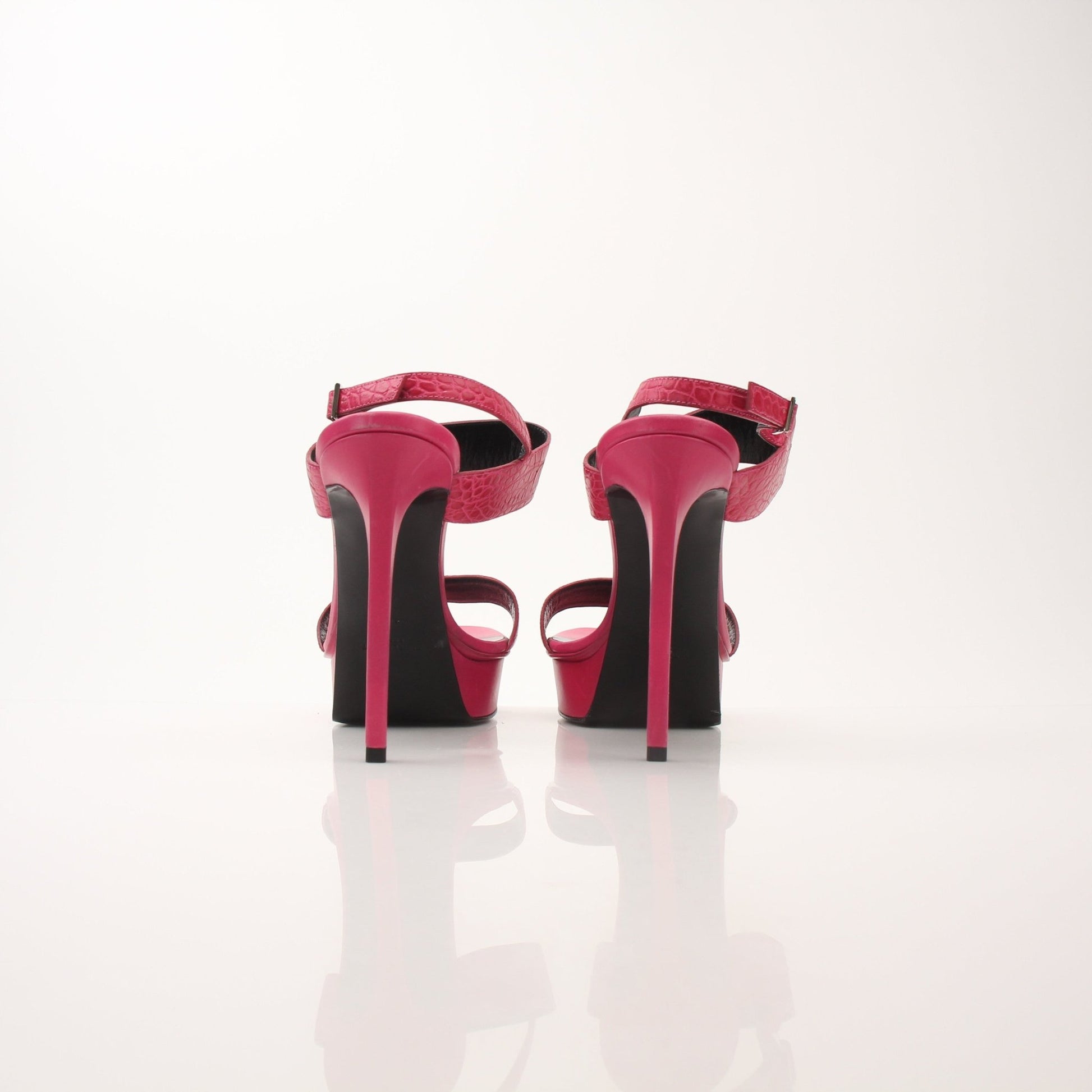 Gold & Beyond Saint Laurent women’s platform sandals with high heels, beige straps, and stylish design.
