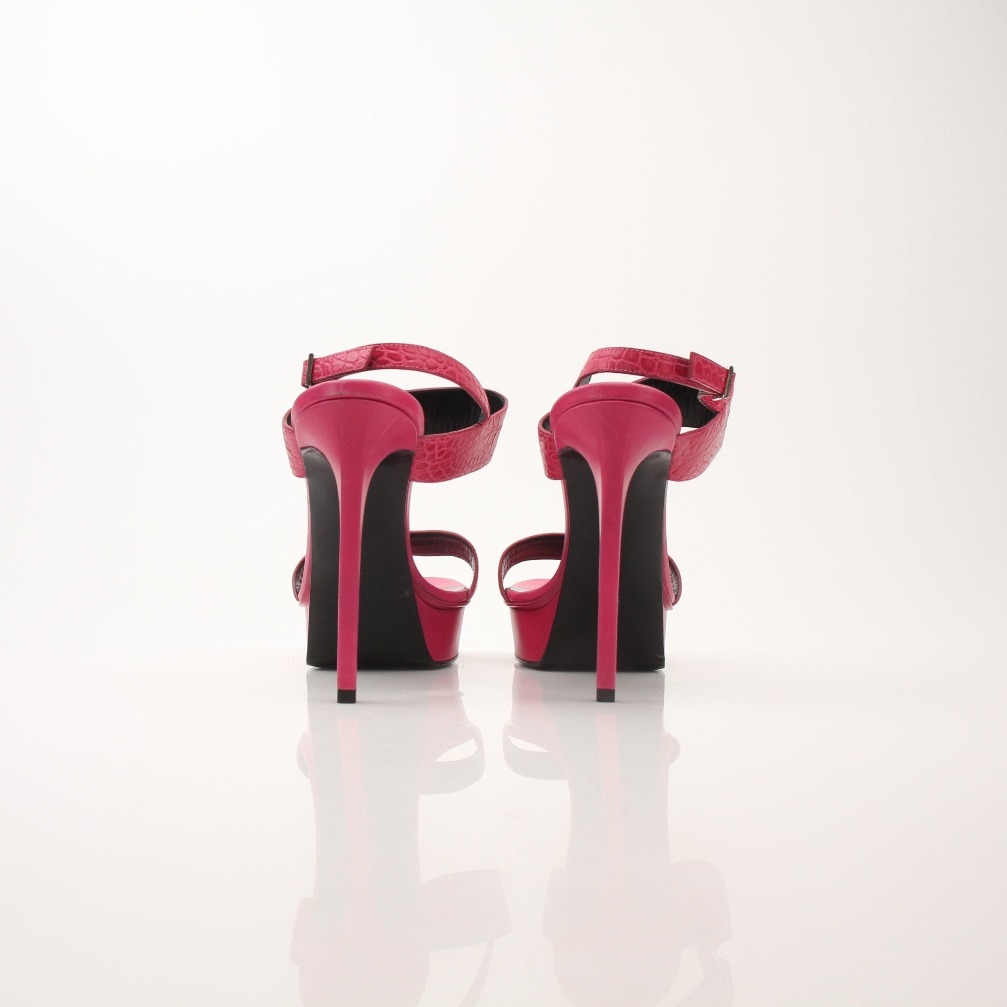 Gold & Beyond Saint Laurent women’s platform sandals with high heels, beige straps, and stylish design.